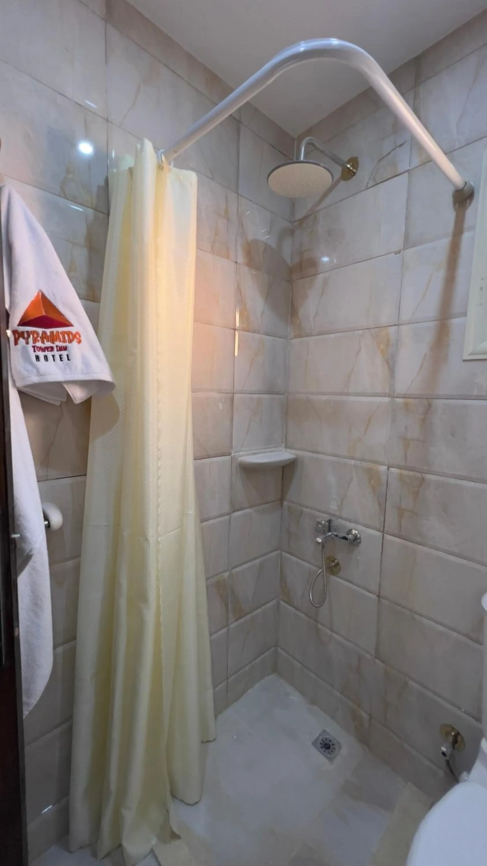 Bathroom in pyramids tower view inn