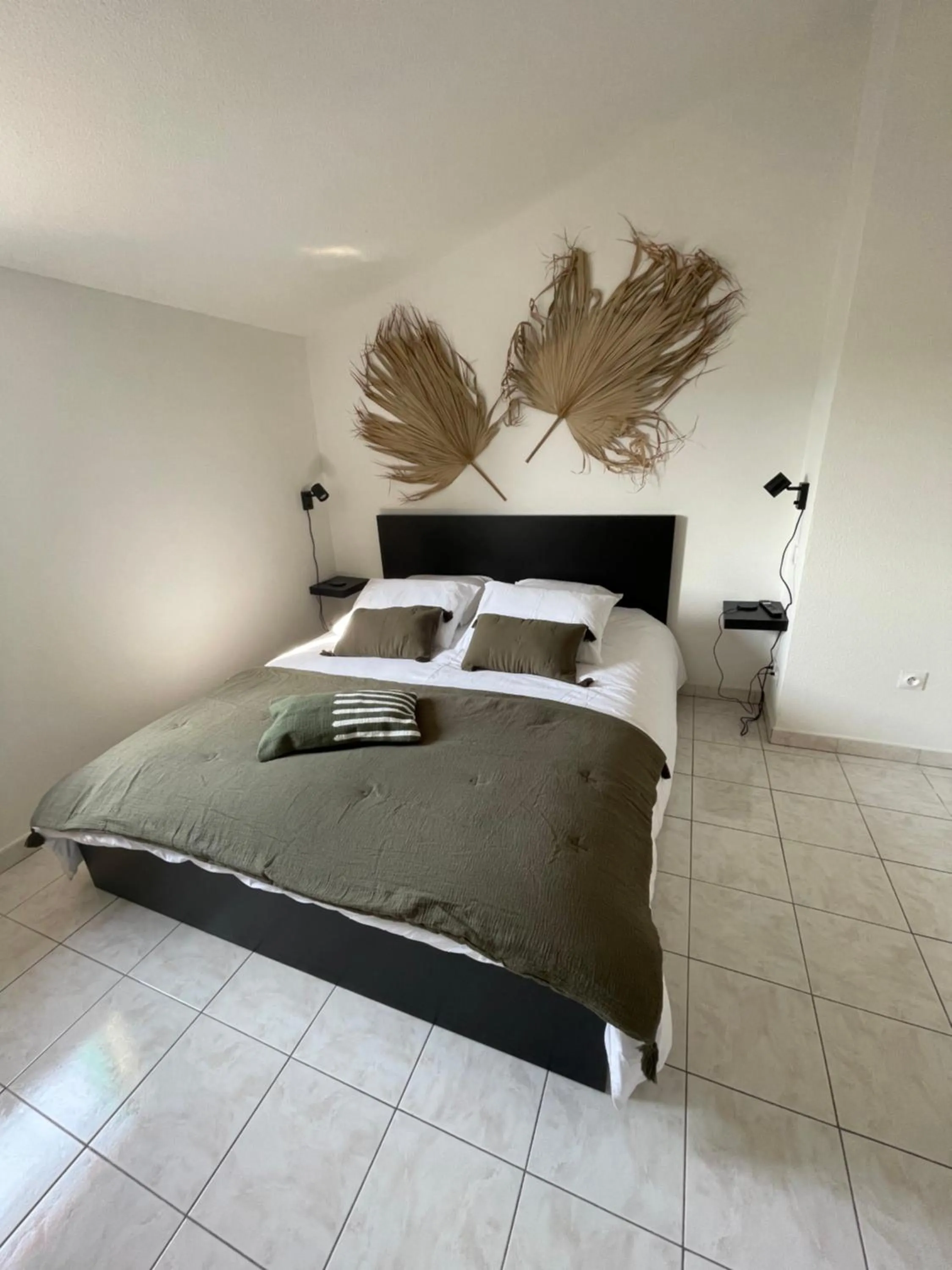 Bed in Appartement avec piscine
