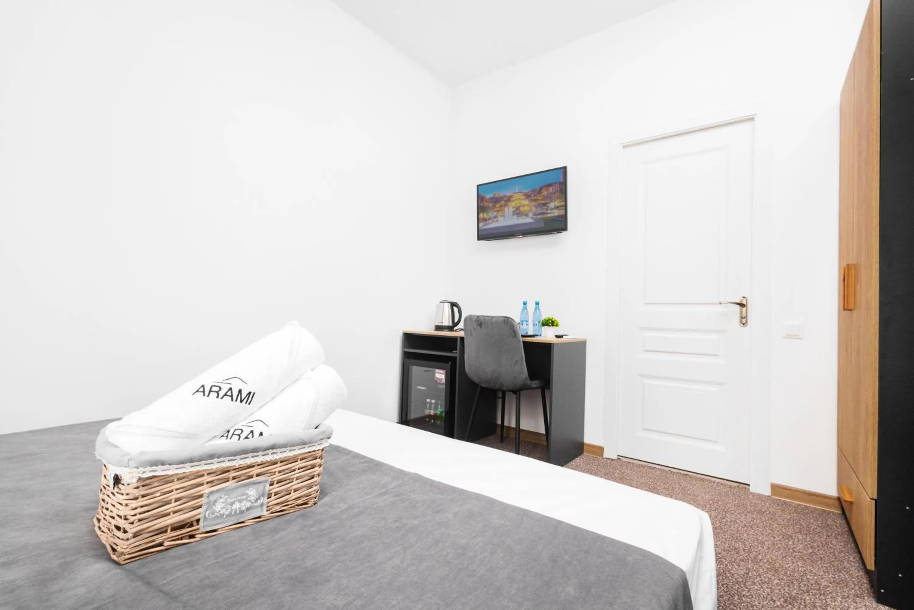 Bed in Hotel Arami by Downtown