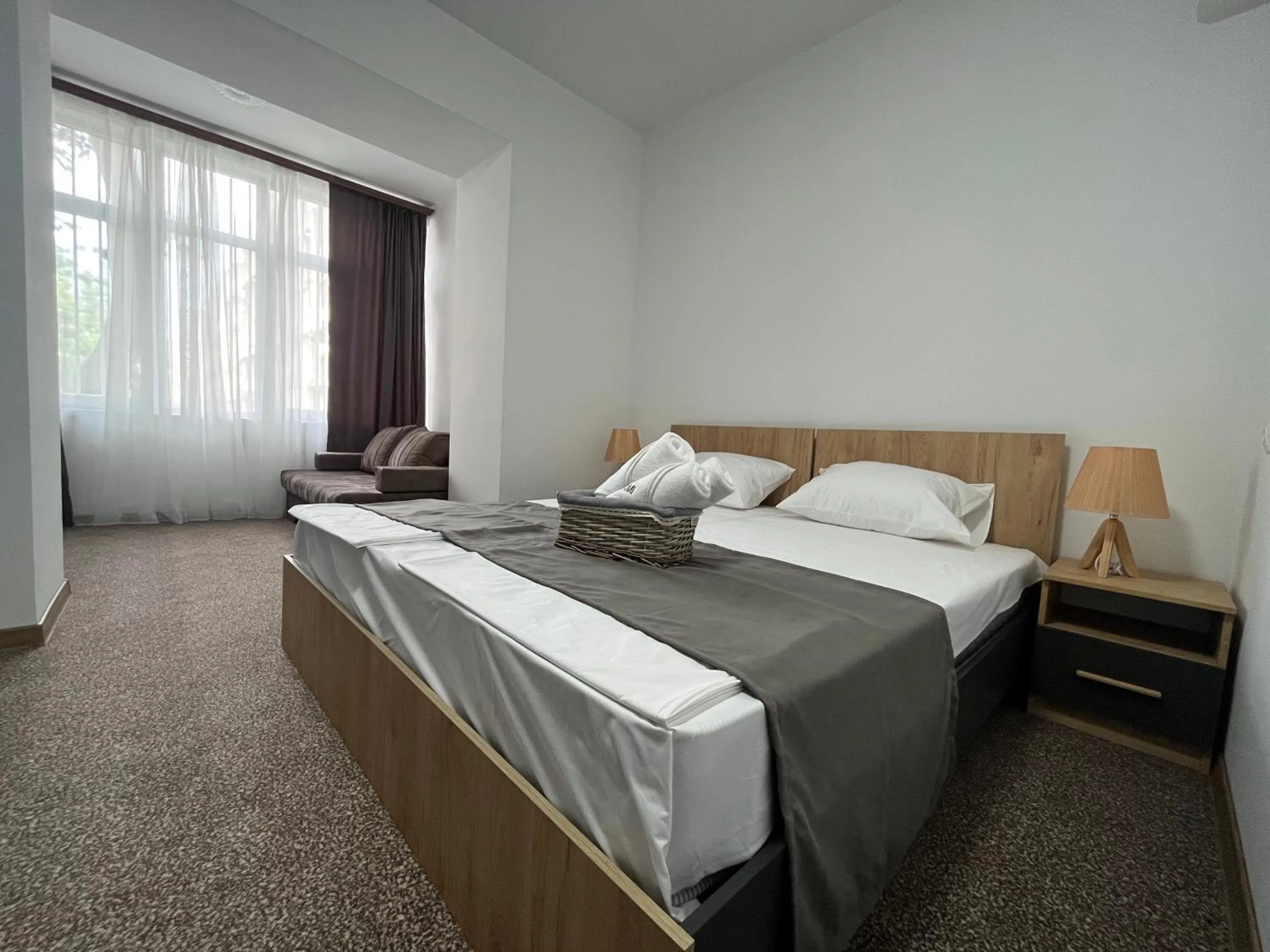 Bed in Hotel Arami by Downtown