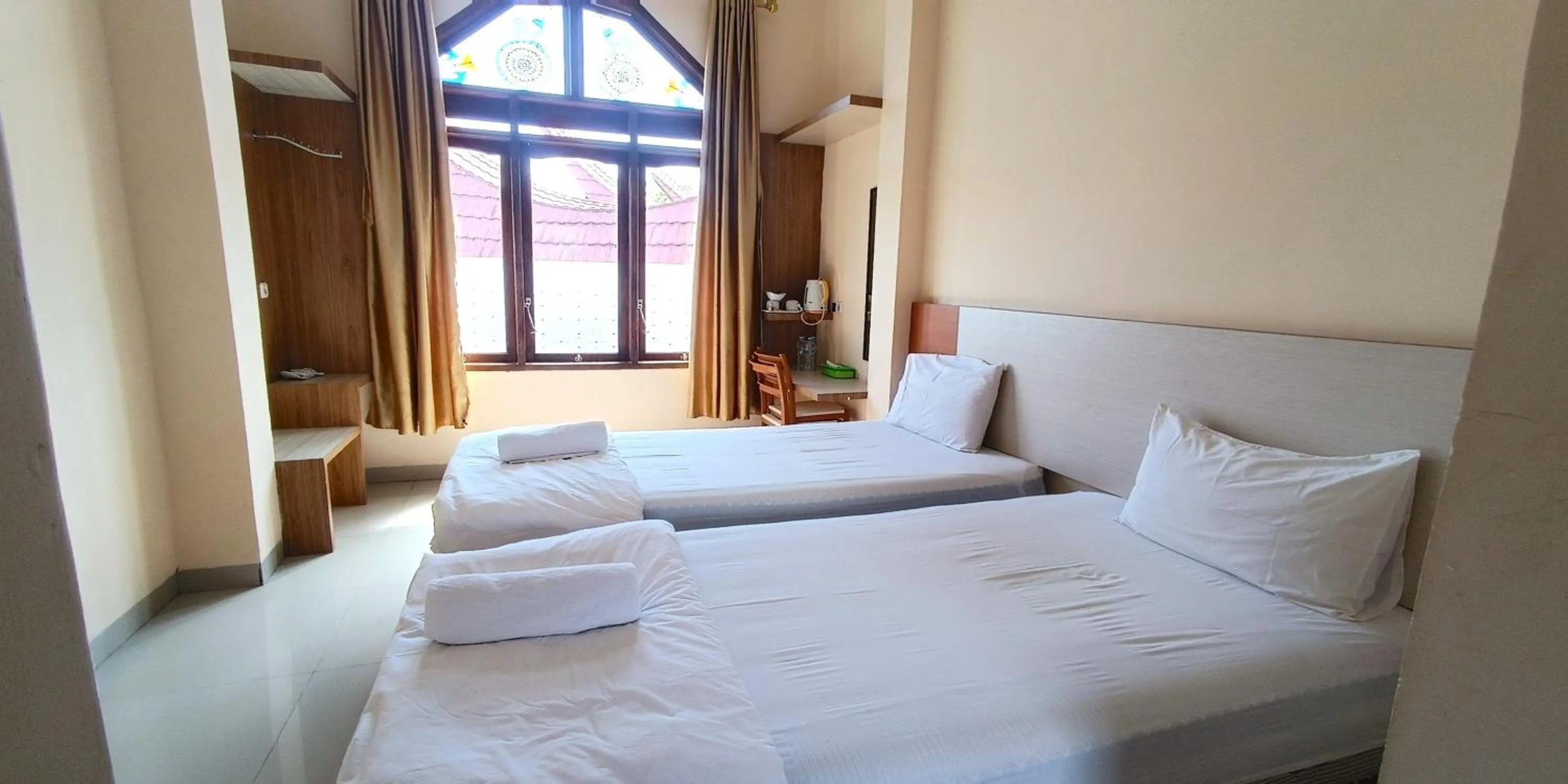 Bed in Hotel Manggasa Makale
