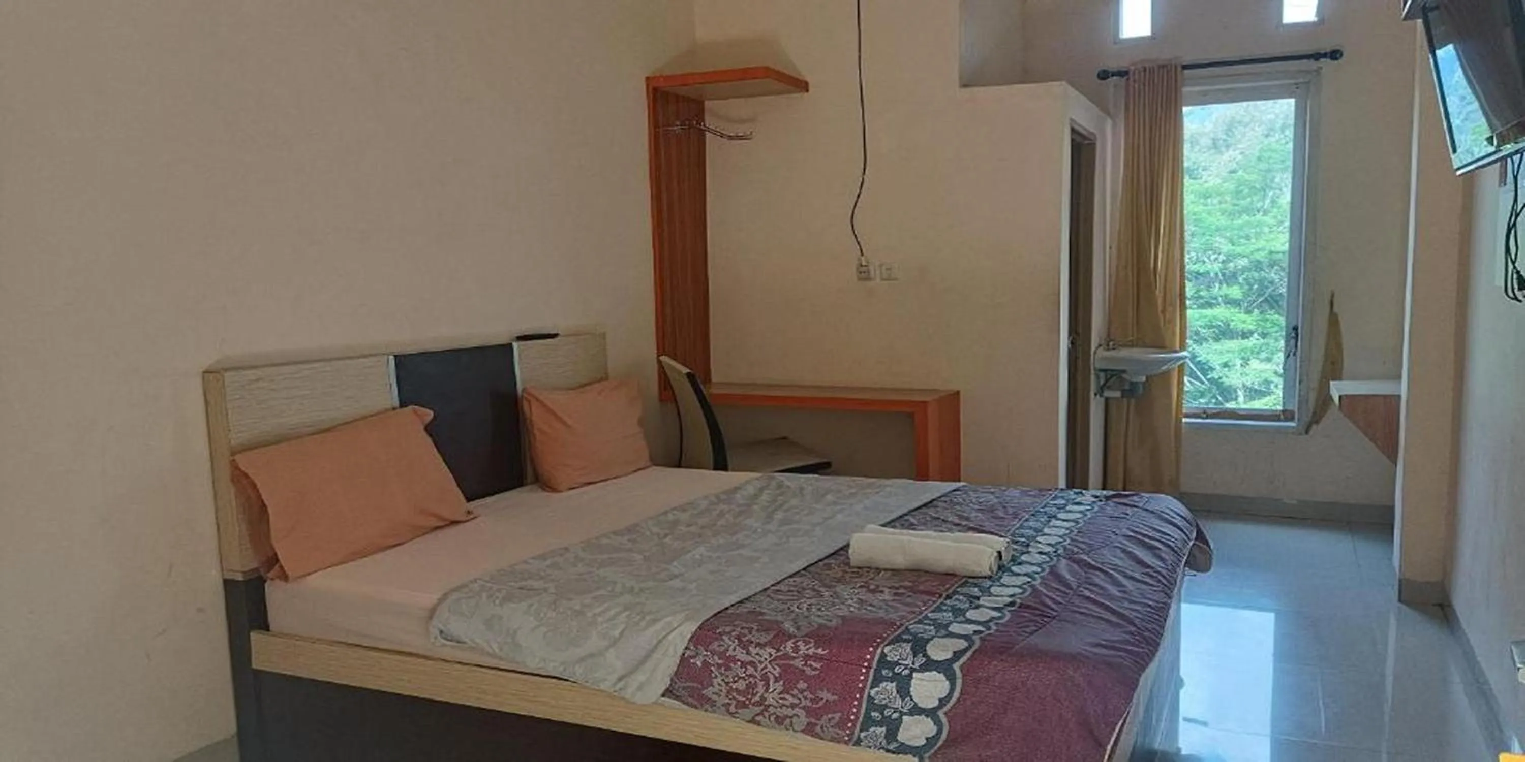 Bed in Hotel Manggasa Makale