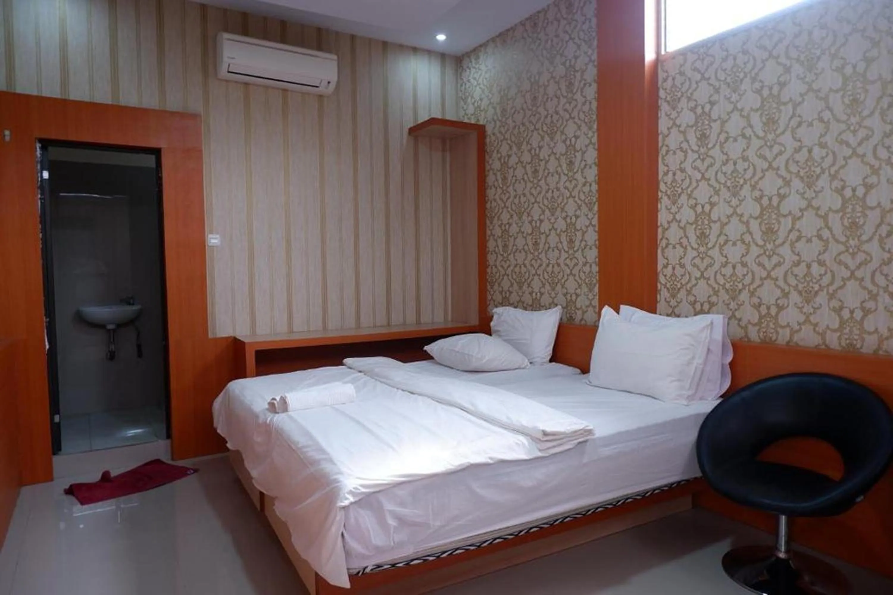 Bed in Hotel Manggasa Makale