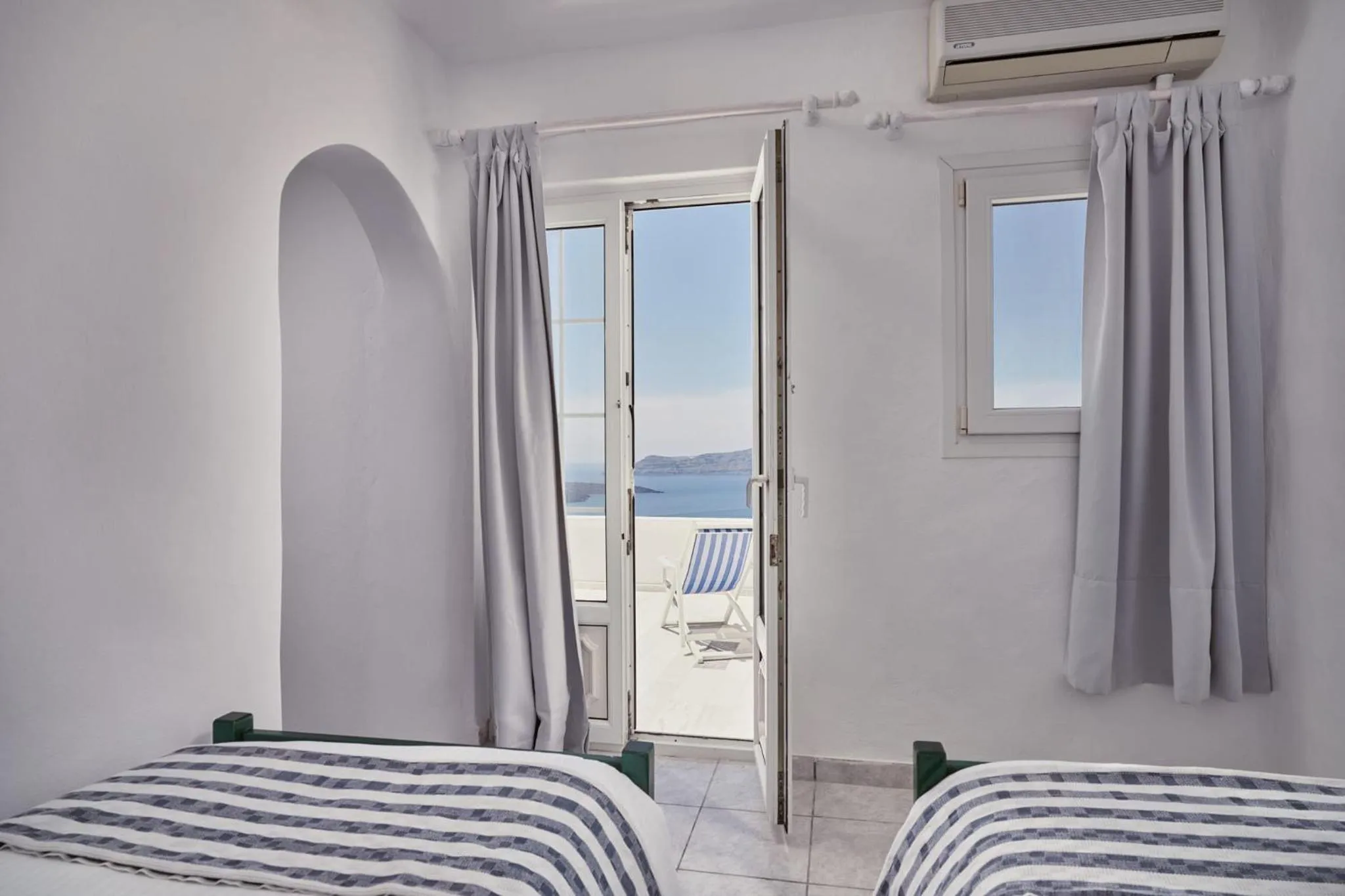 Bed in Amphitheater Cave Houses