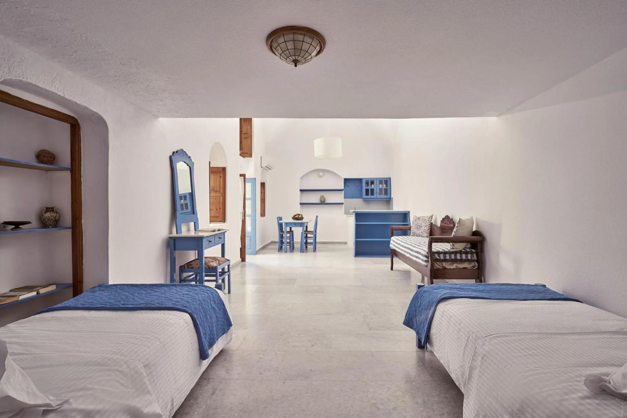 Bed in Amphitheater Cave Houses