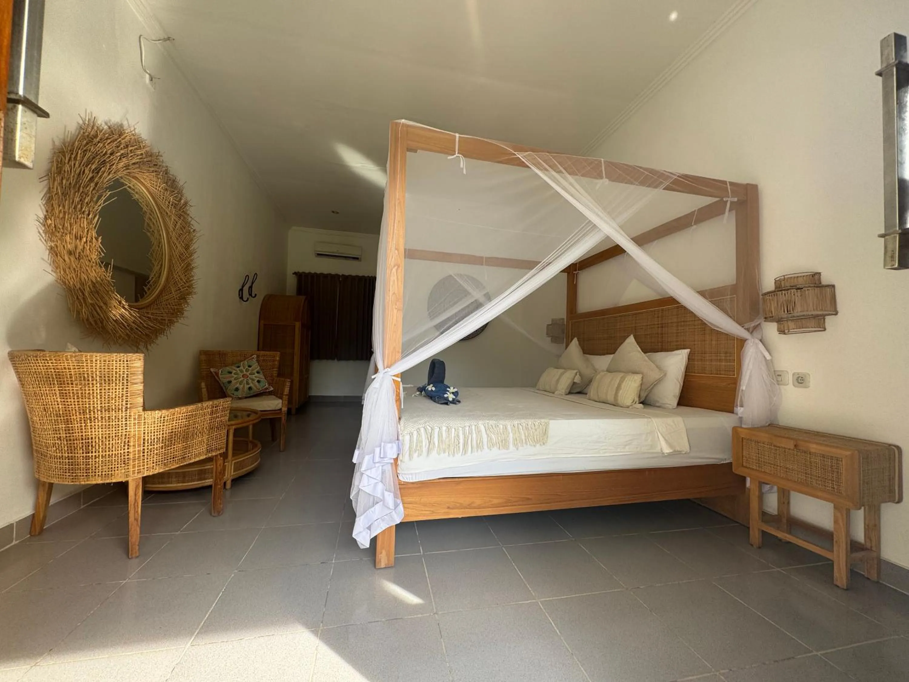 Bed in Blue EmOcean Dive Resort