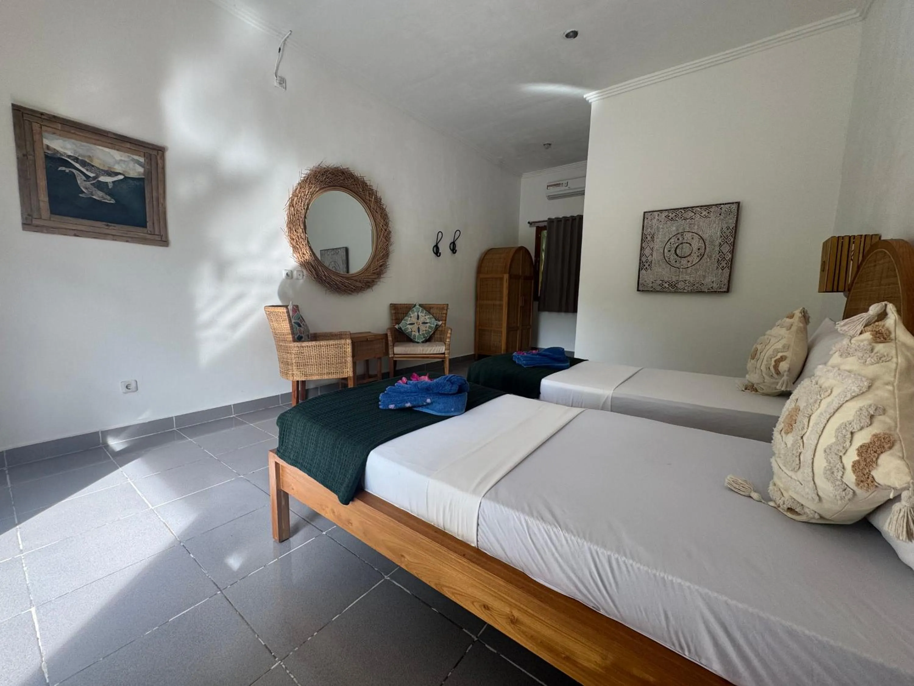 Bed in Blue EmOcean Dive Resort