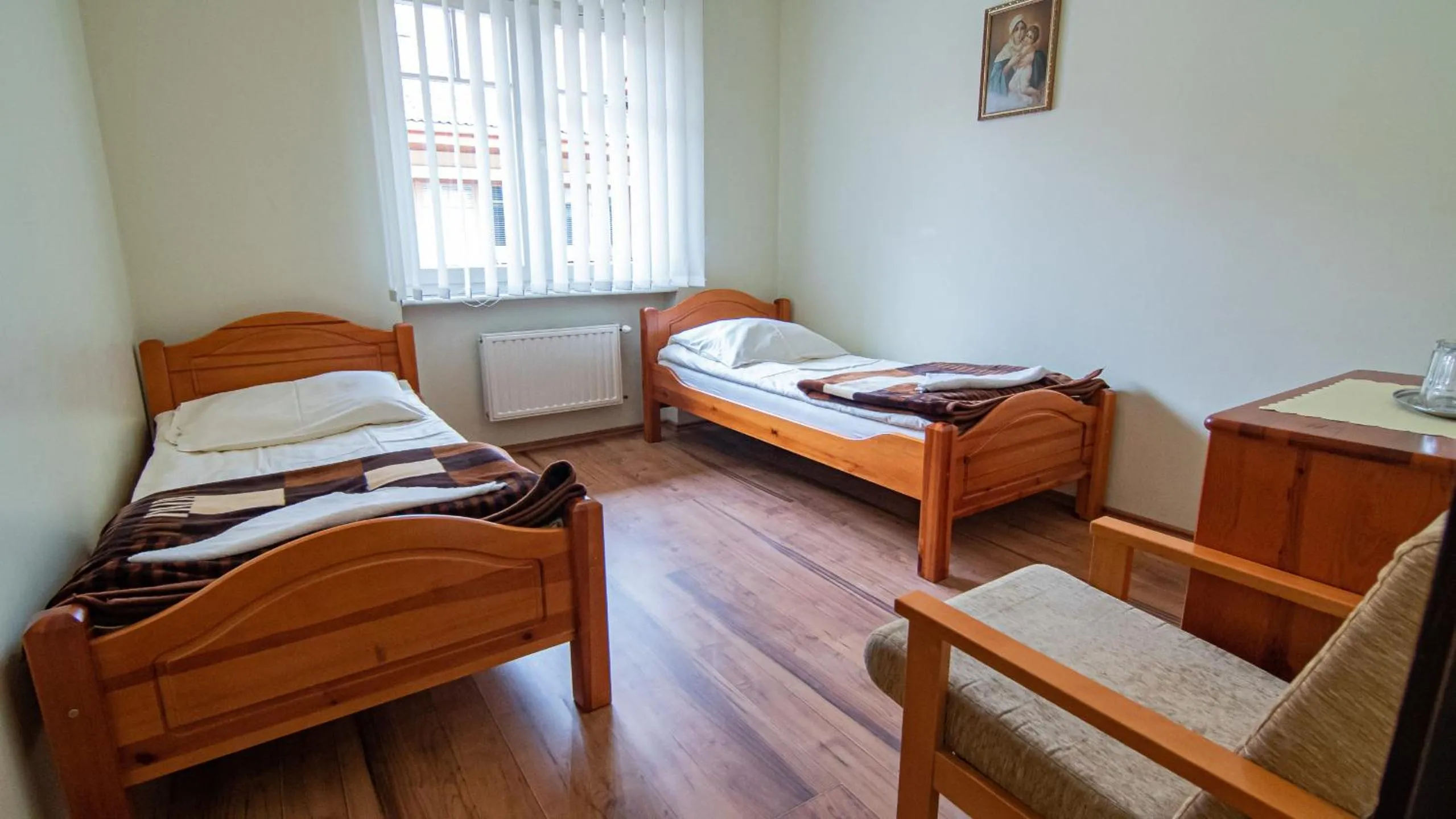 Photo of the whole room, Bed in Centrum Edukacyjno-Formacyjne, Dom Rekolekcyjny w Koszalinie
