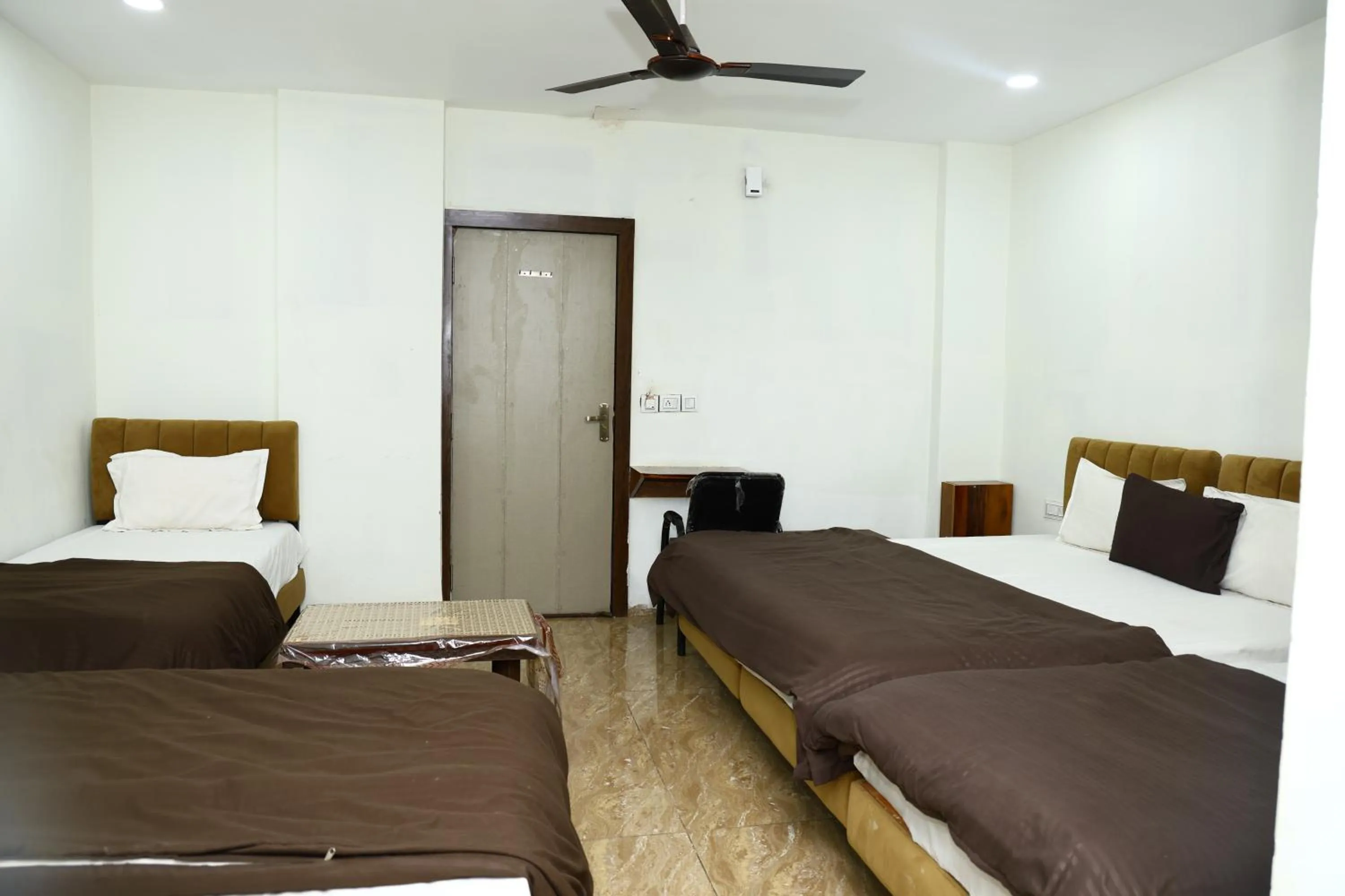 Bed in Hotel Kiwi Inn