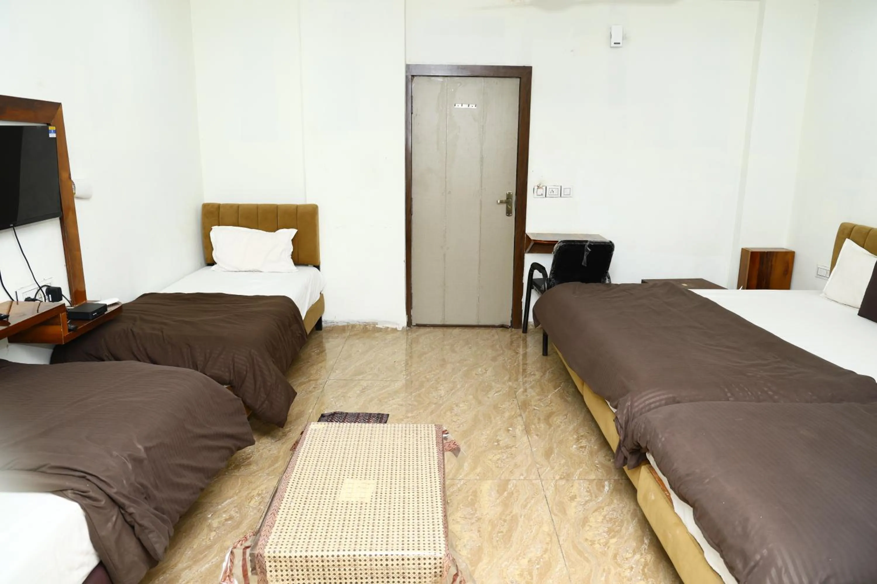 Bed in Hotel Kiwi Inn