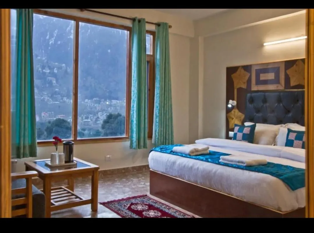 View (from property/room), Bed in Hotel Sky Heaven