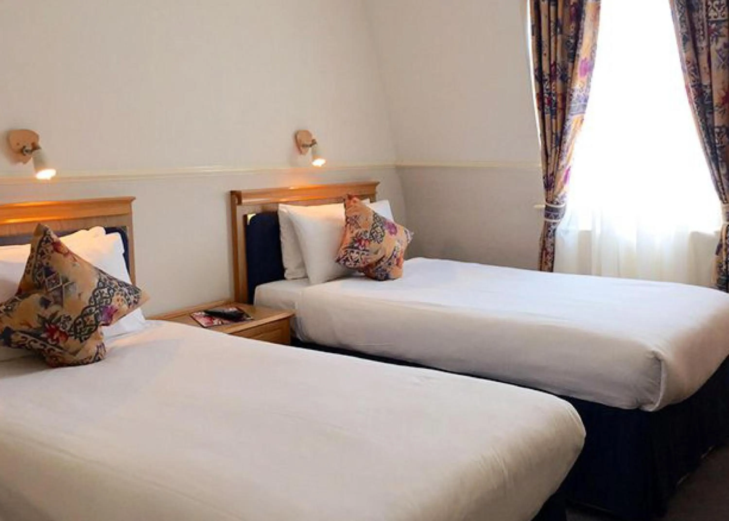 Bed in Berjaya Eden Park London Hotel