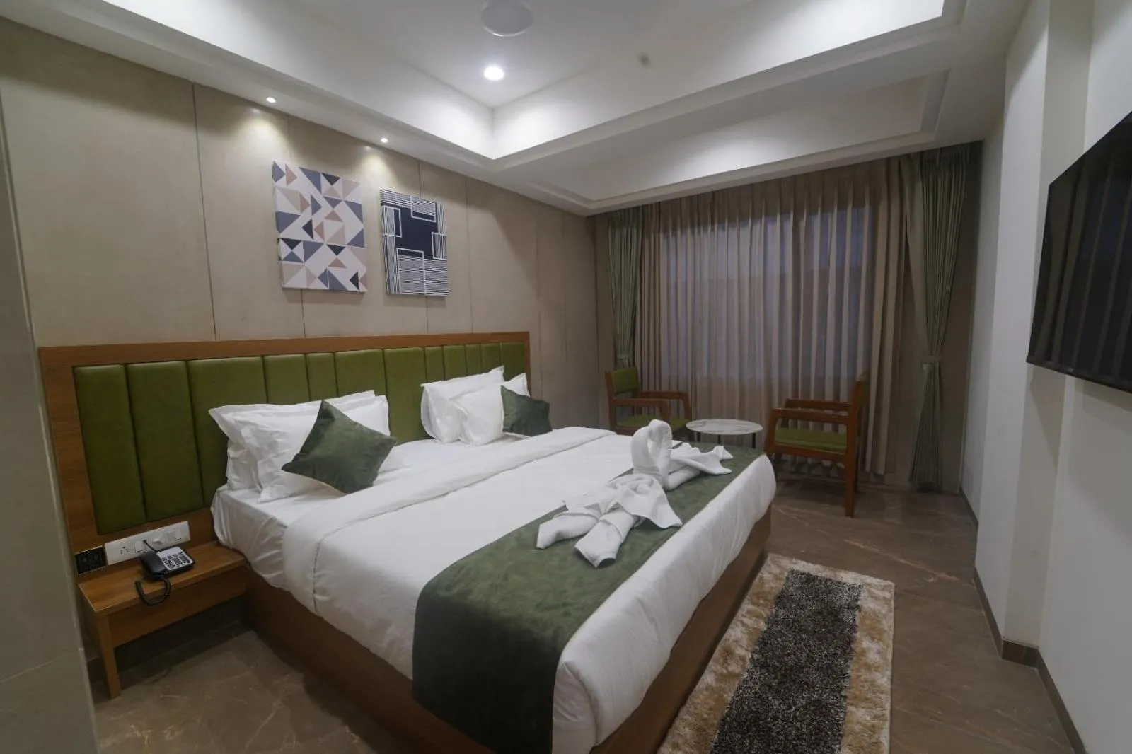 Bed in HOTEL STATURE INN