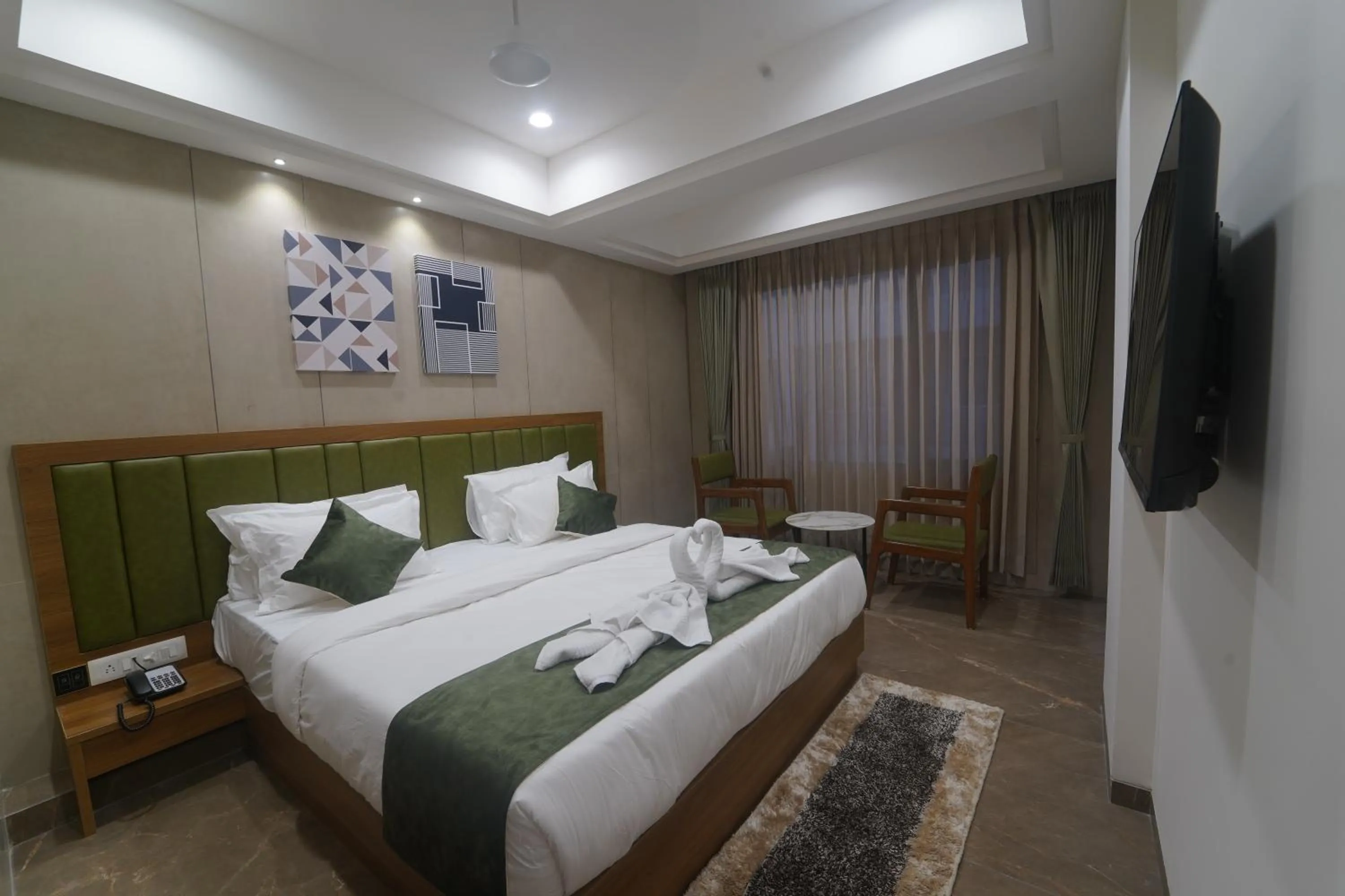 Bed in HOTEL STATURE INN