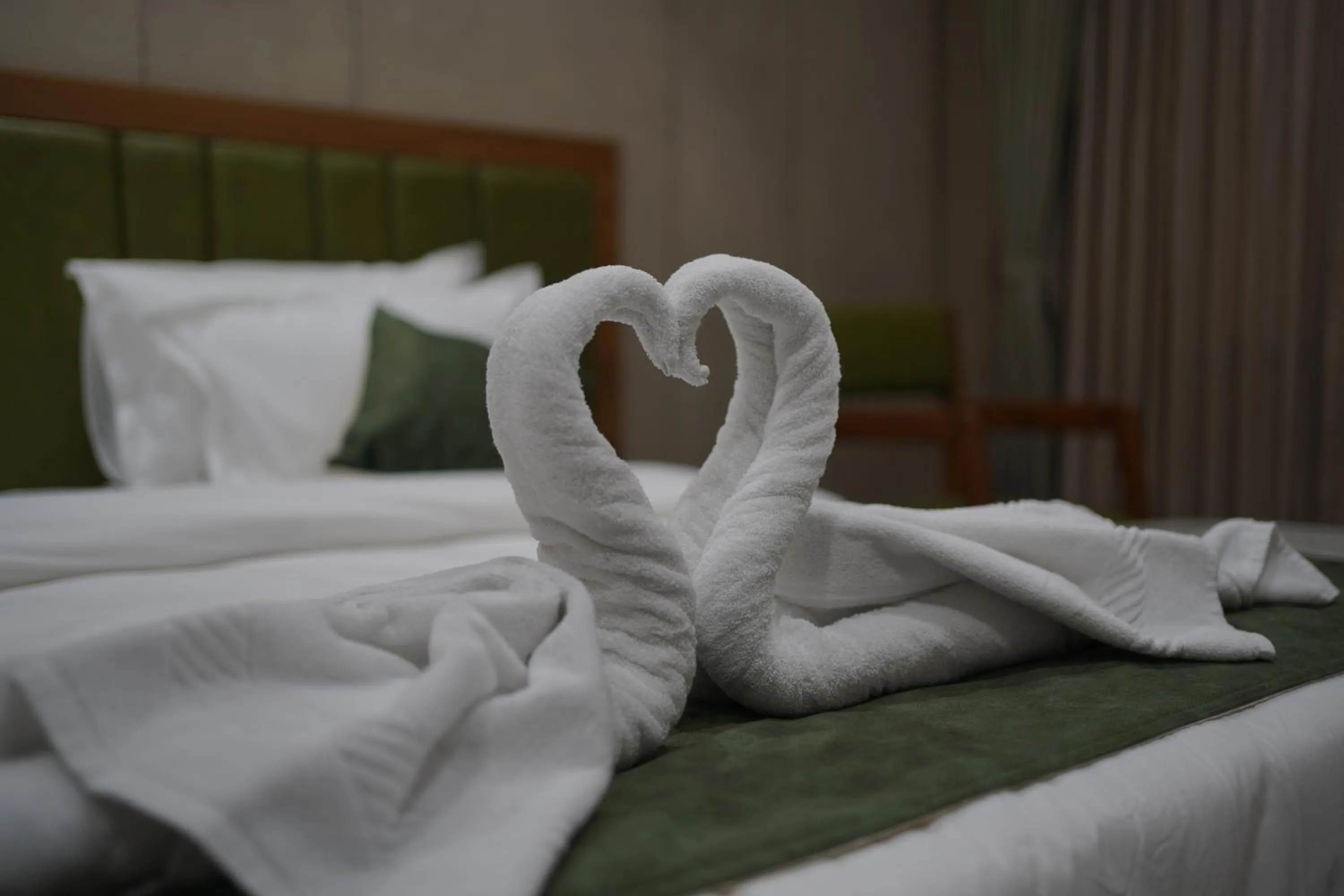 Bed in HOTEL STATURE INN