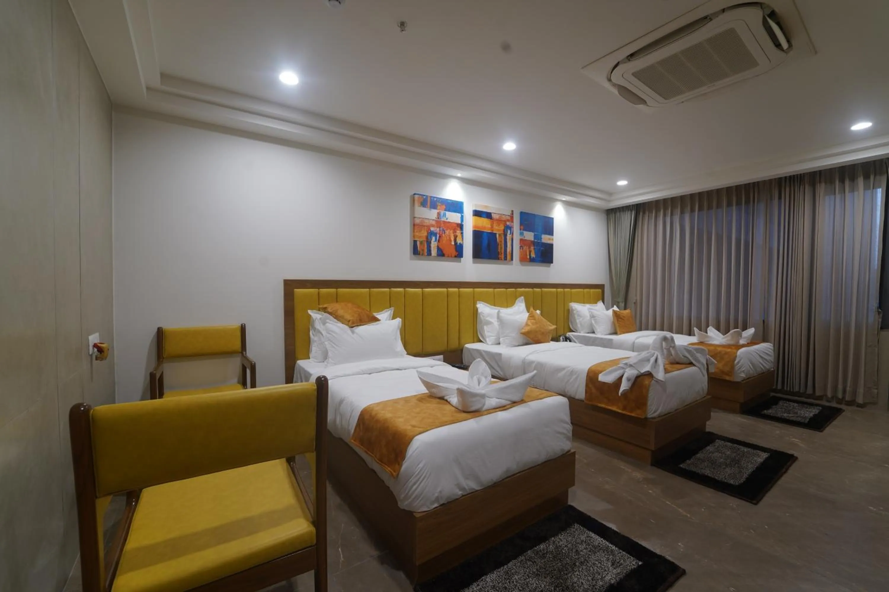 Bed in HOTEL STATURE INN