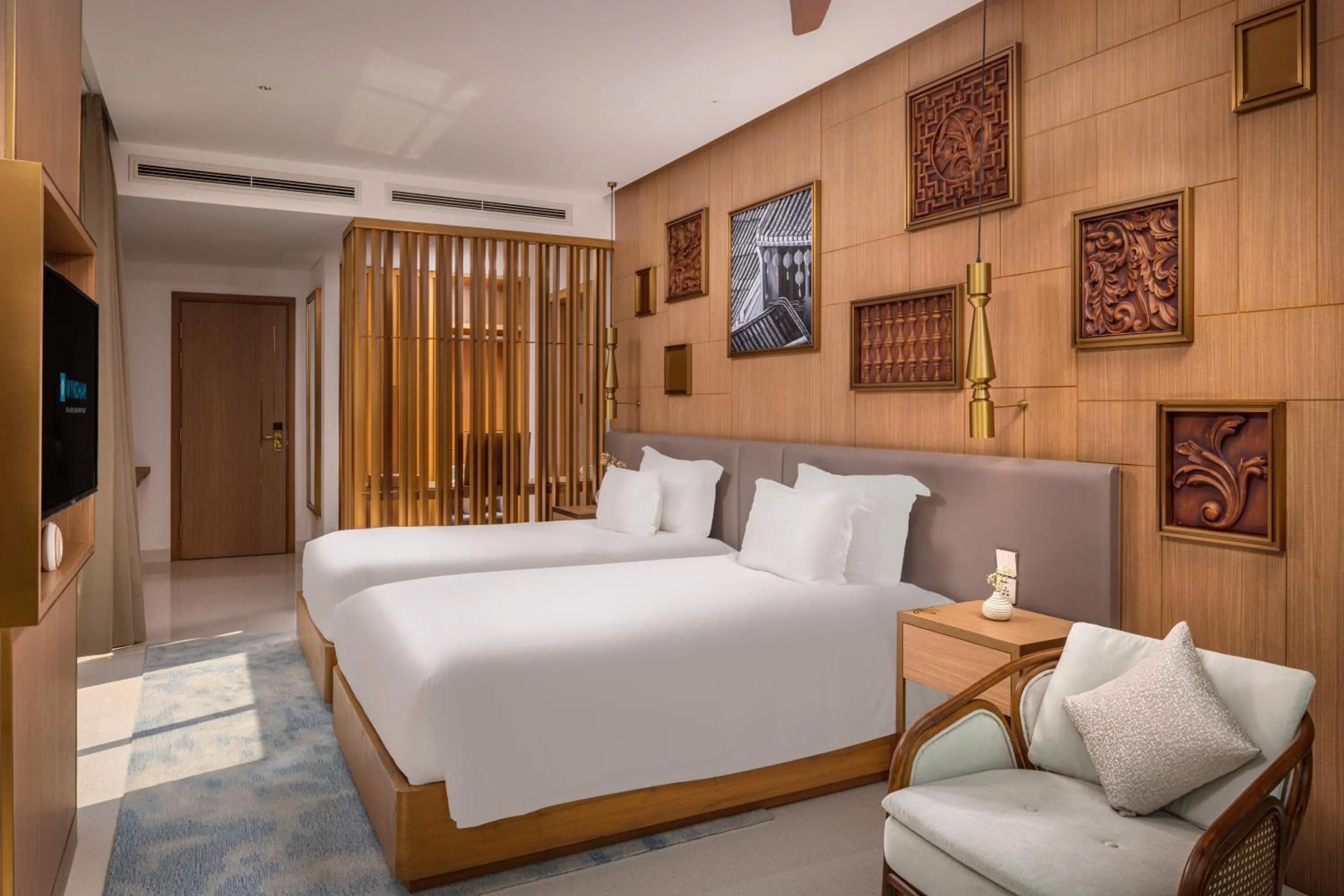 Bed in Wyndham Hoi An Royal Beachfront Resort & Villas