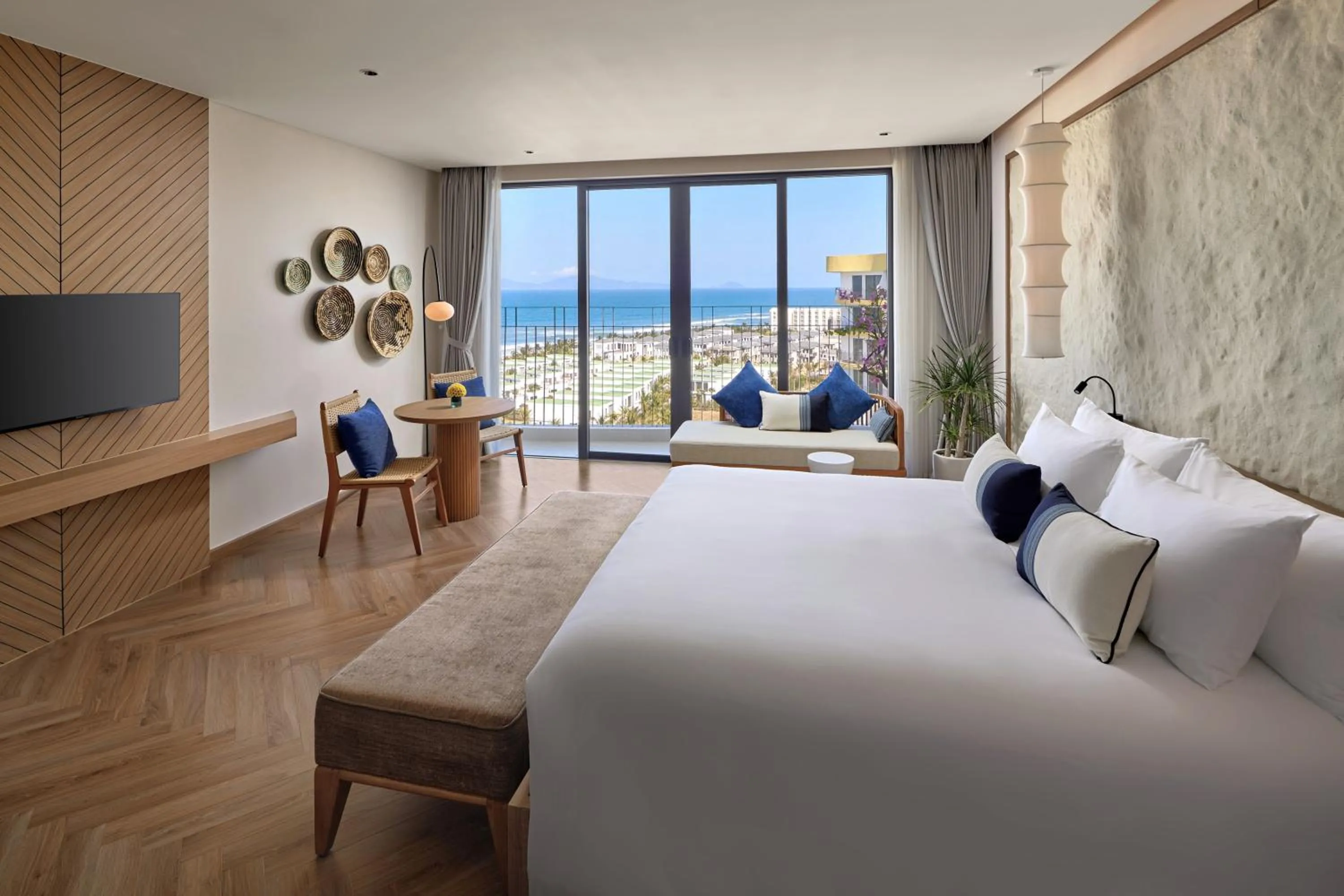 Bed in Wyndham Hoi An Royal Beachfront Resort & Villas