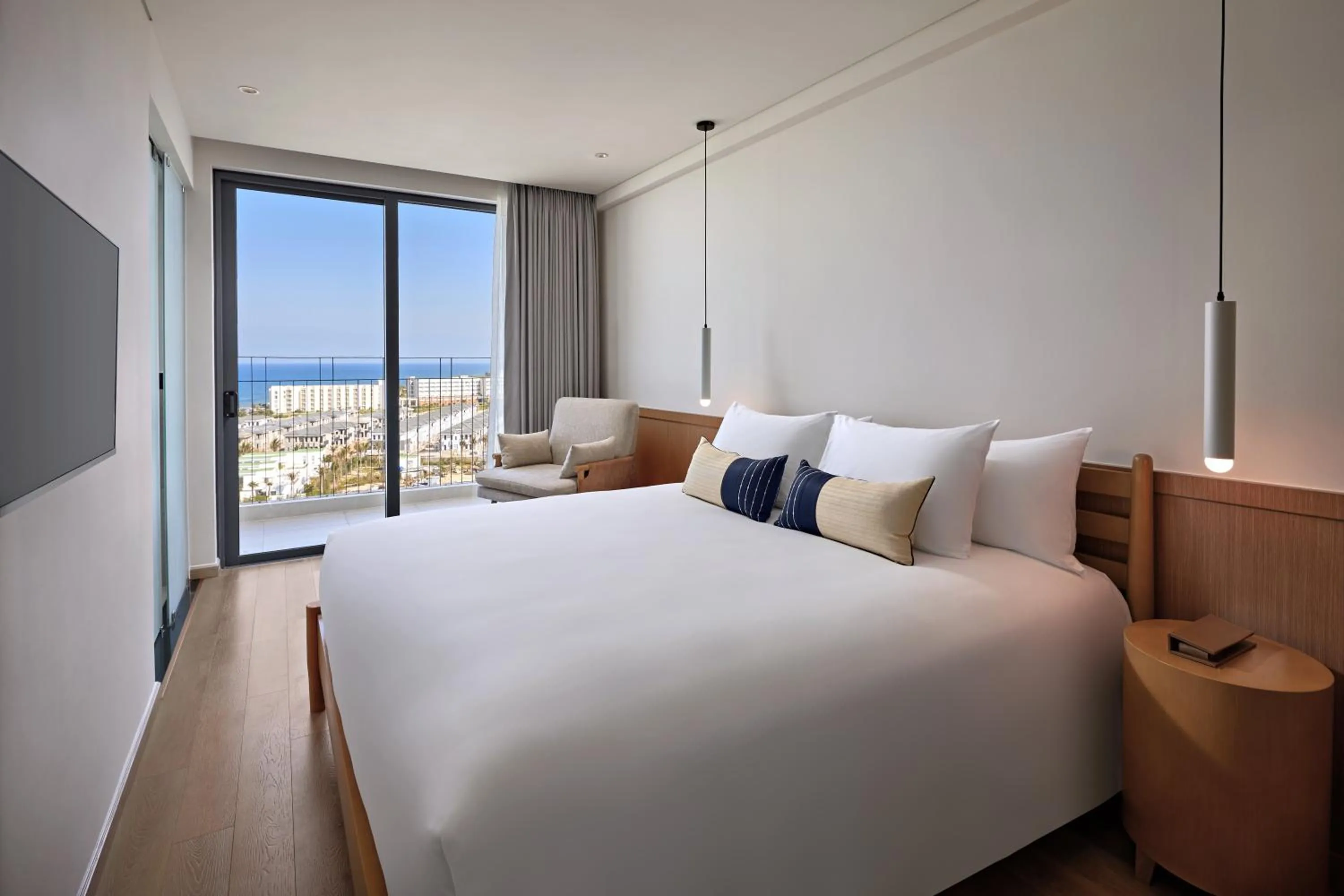 Bed in Wyndham Hoi An Royal Beachfront Resort & Villas