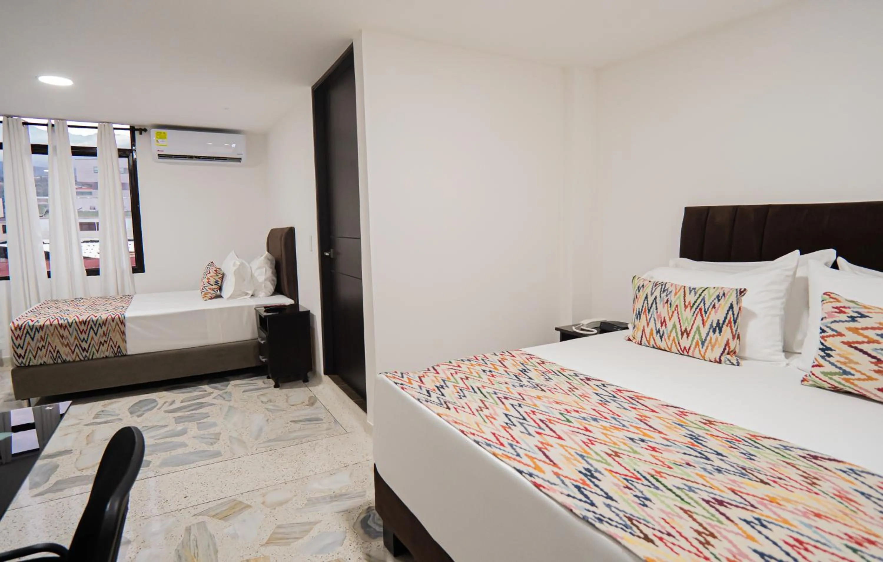 Bed in Hotel Arisha Cali