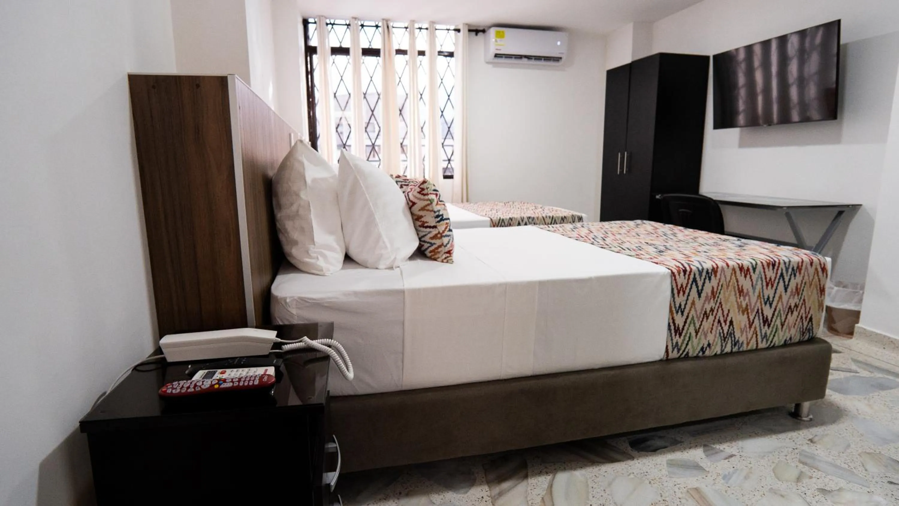 Bed in Hotel Arisha Cali