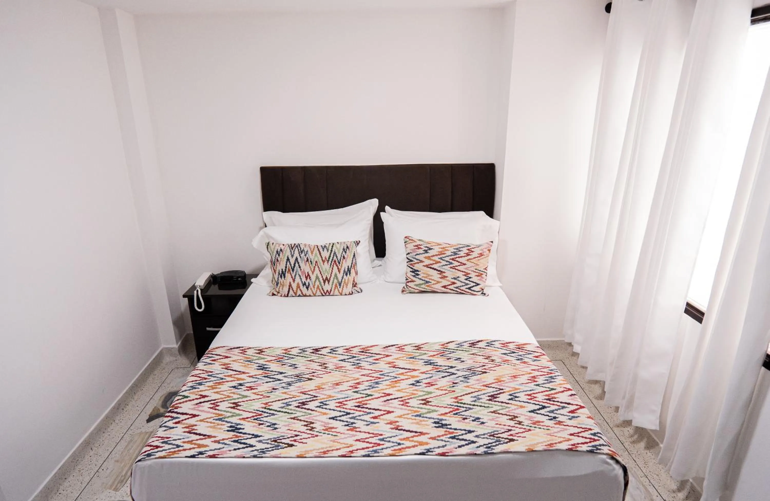 Bed in Hotel Arisha Cali