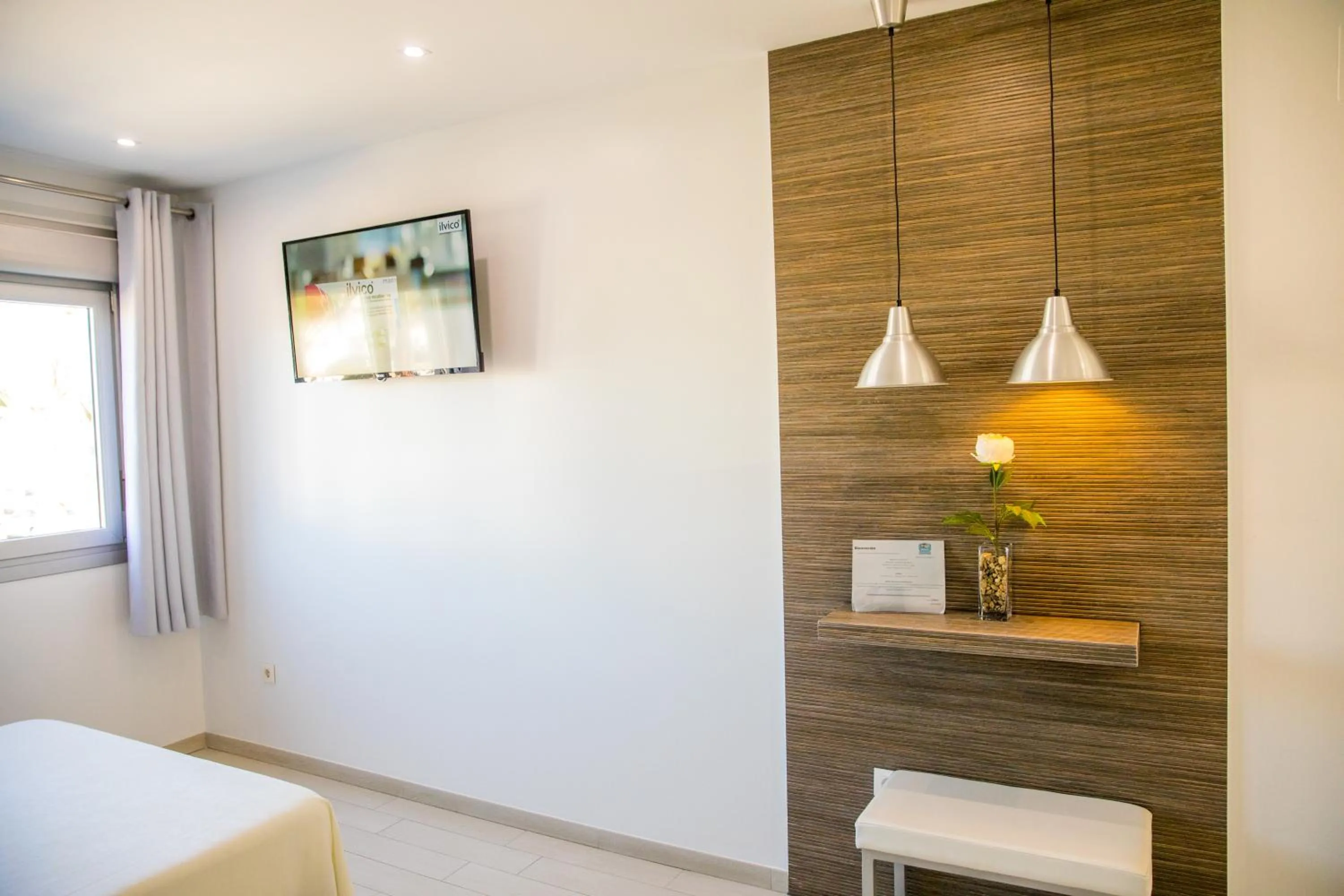 Photo of the whole room in Apartahotel Énfasis-Group