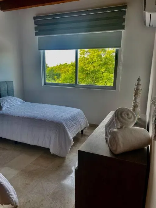 Bed in Departamento Xhelin Maya, exclusivo en Playa del Carmen, Quintana Roo