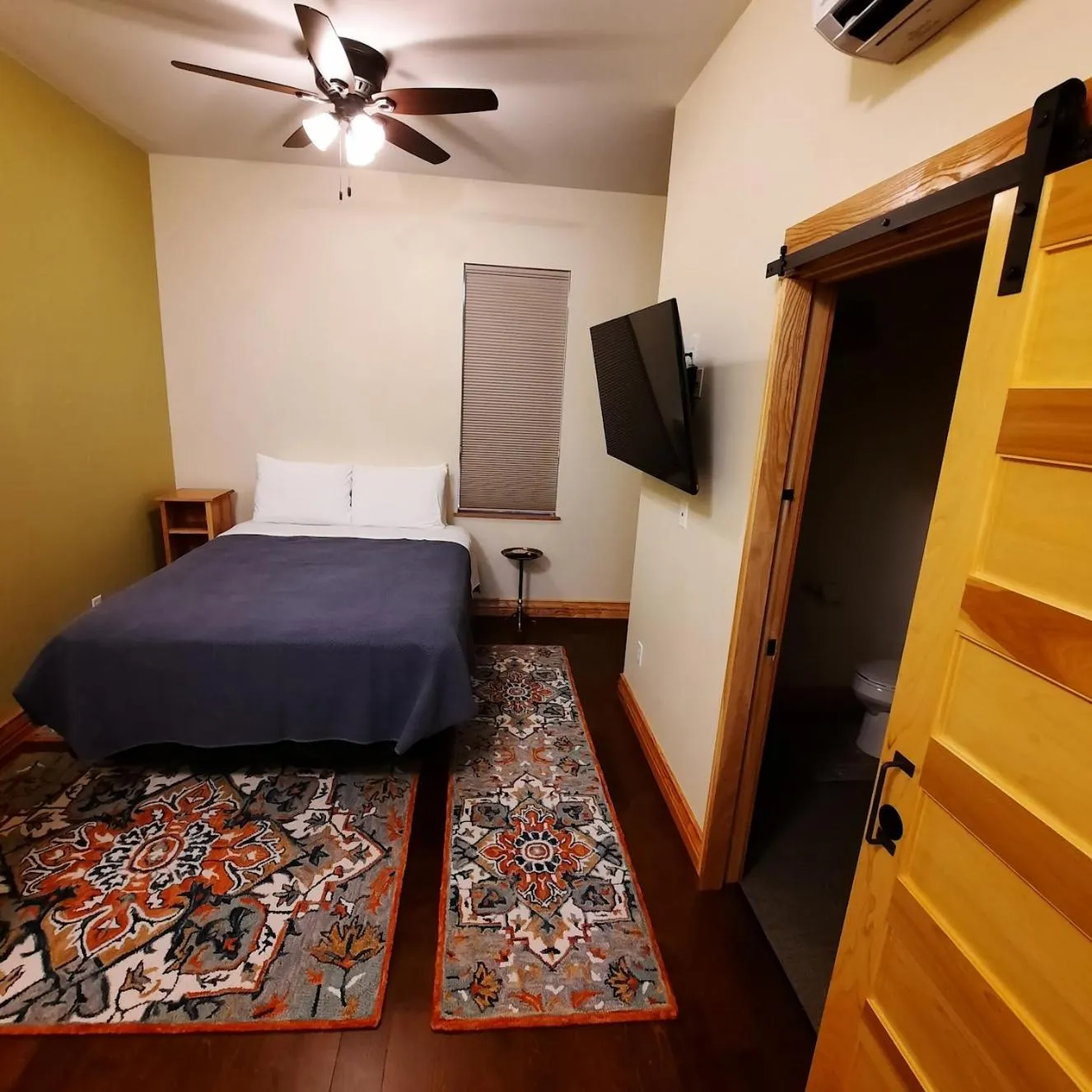 Bed in Goldfinch Suites