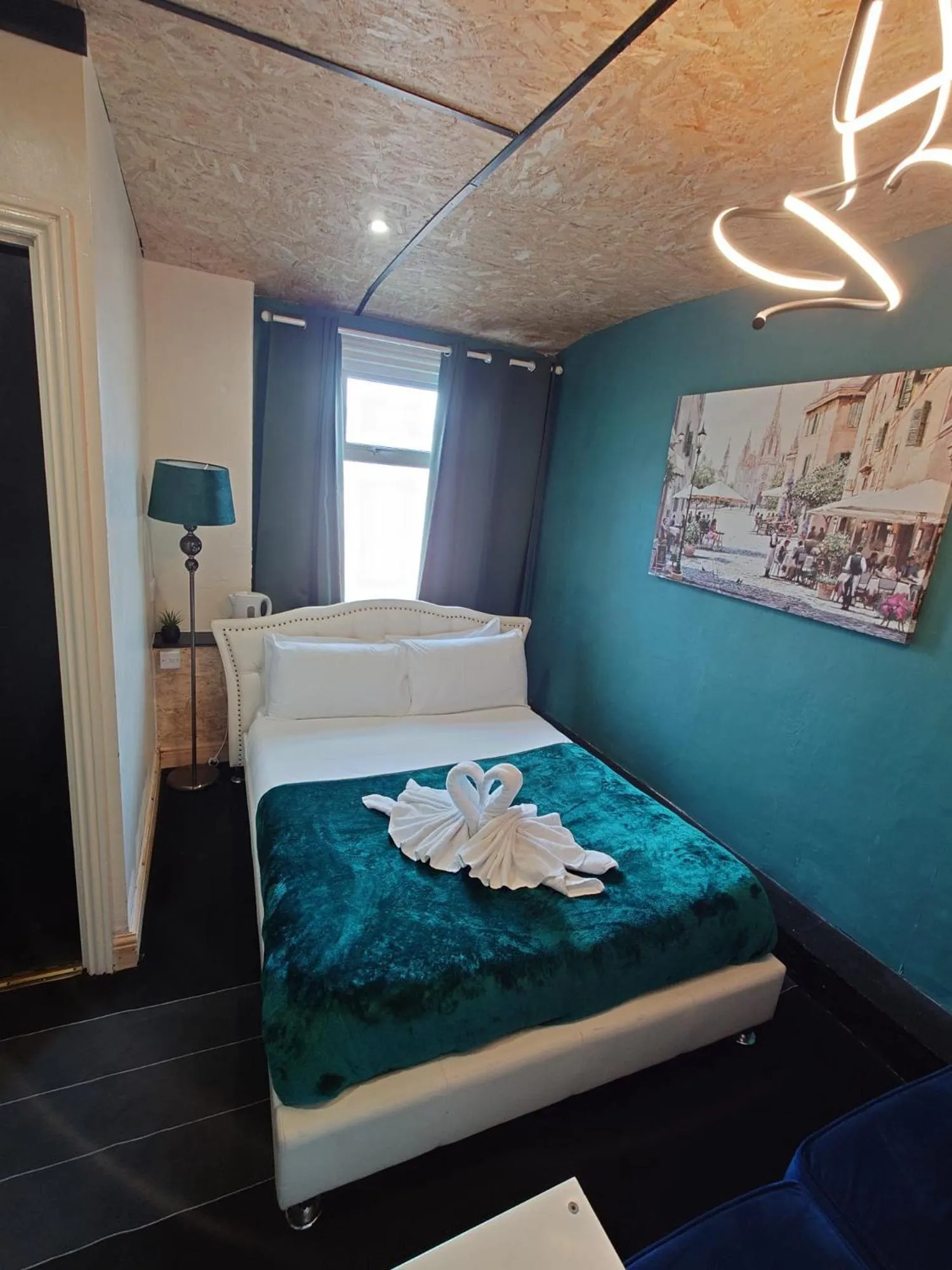 Bed in Harriette's Guest House