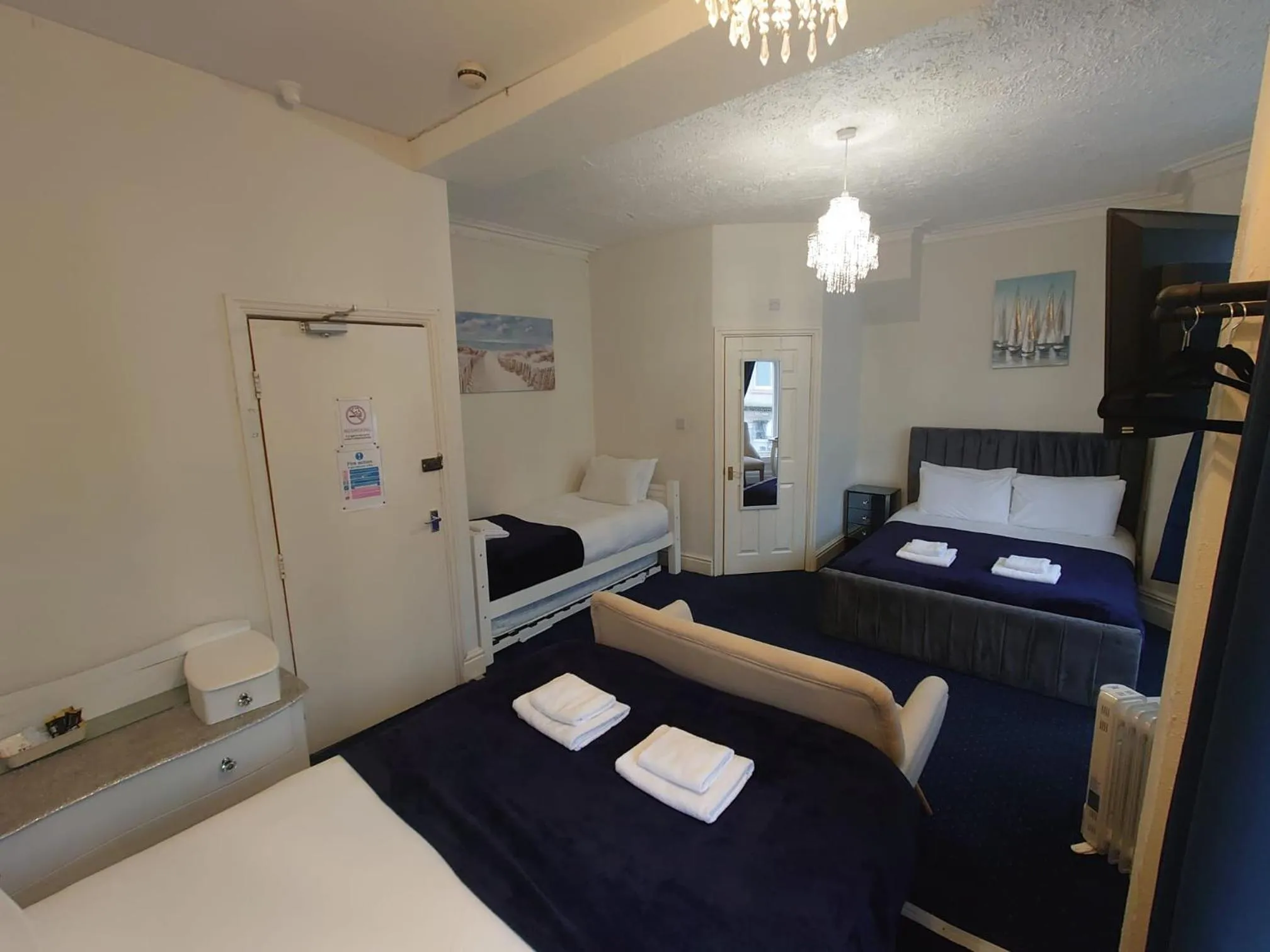 Bed in Harriette's Guest House