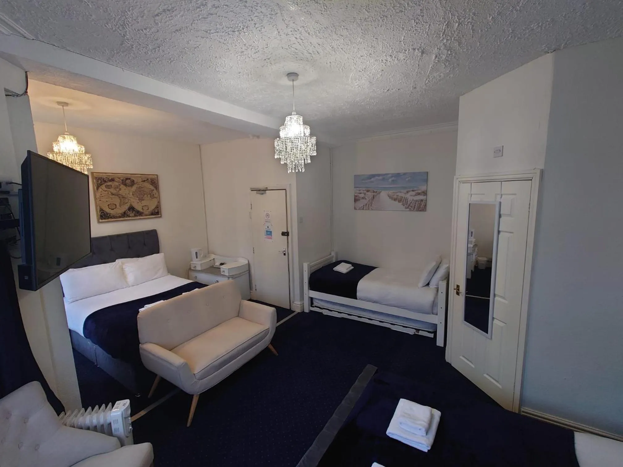 Bed in Harriette's Guest House