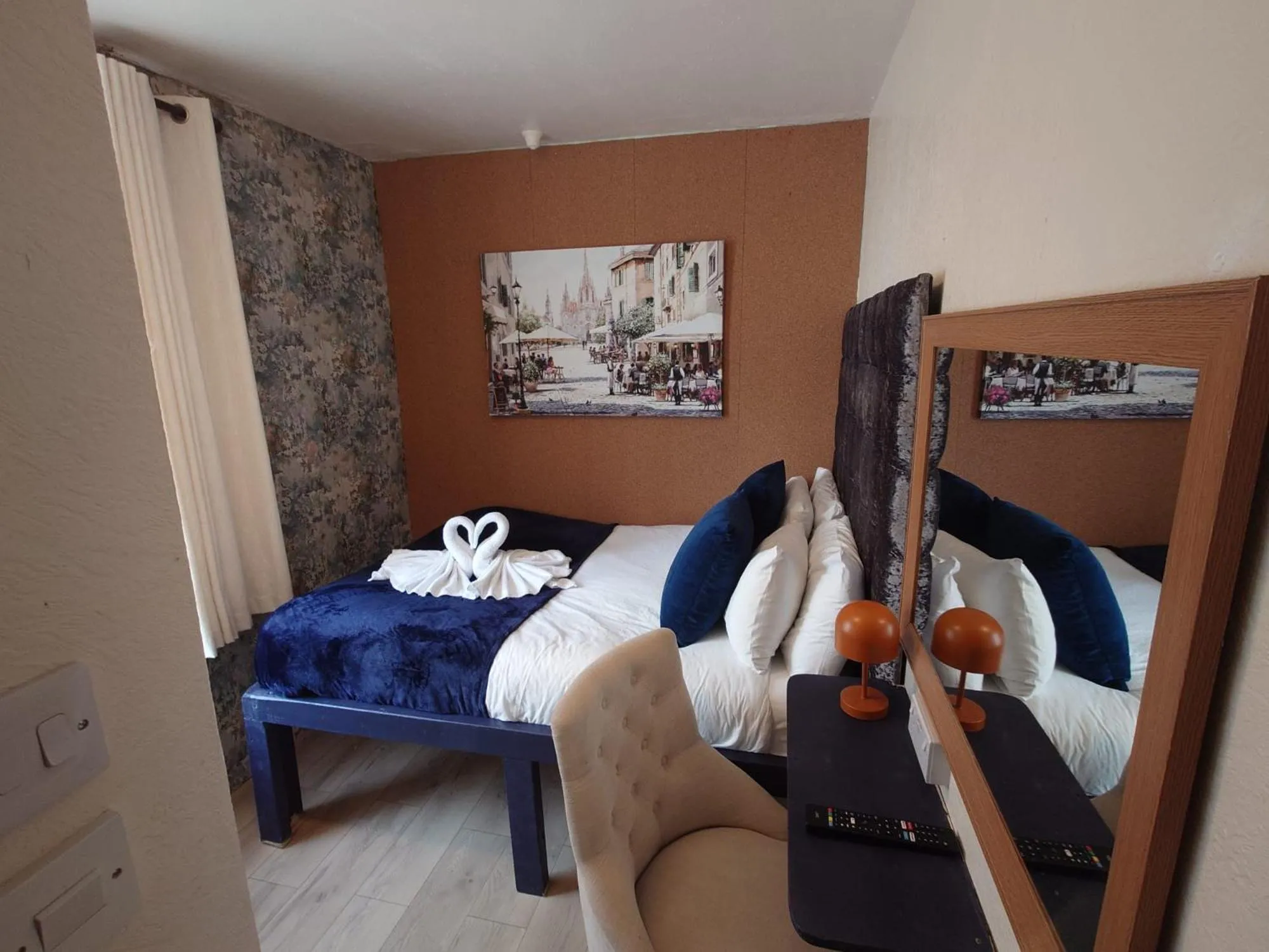 Bed in Harriette's Guest House