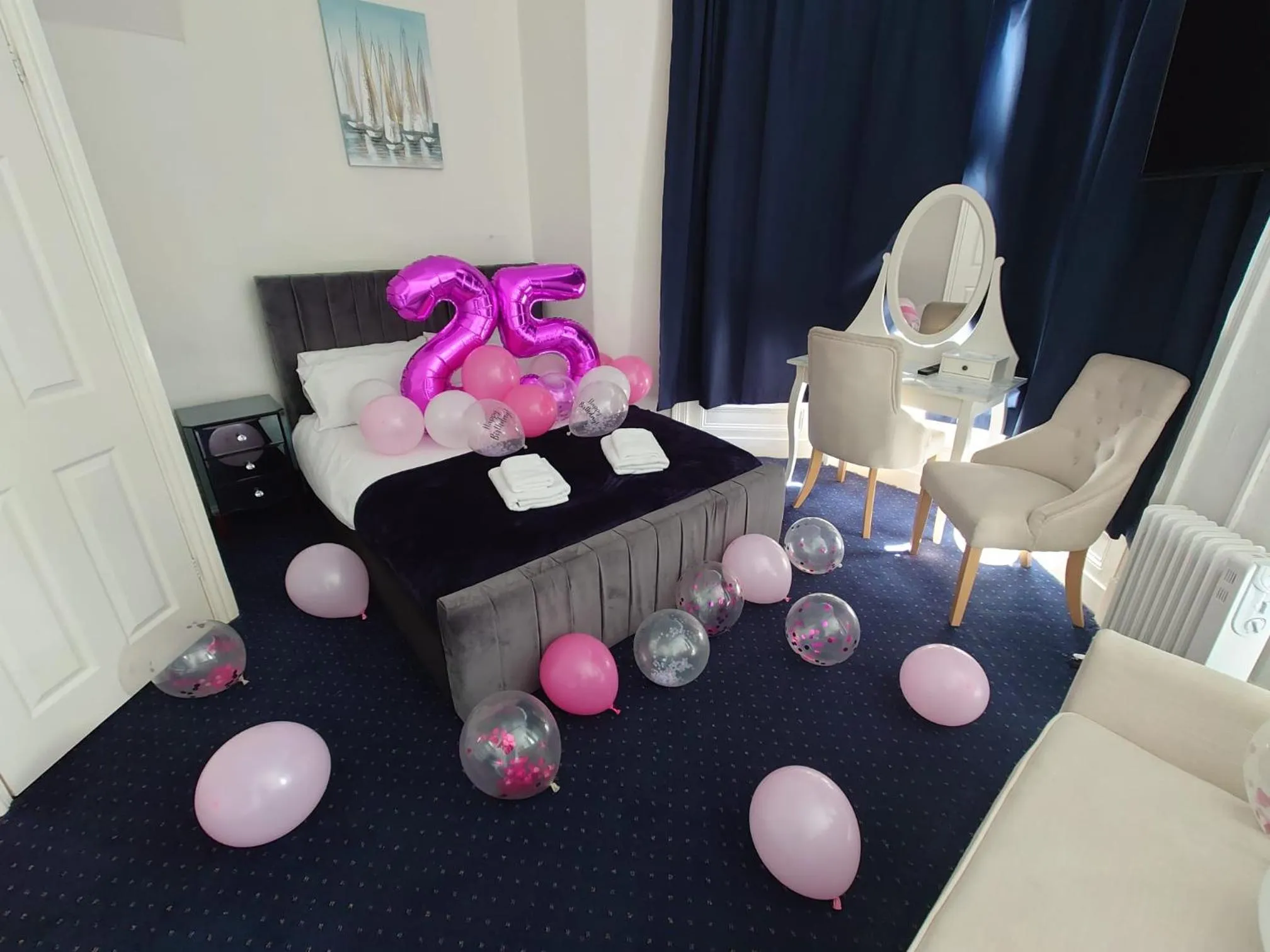 Bed in Harriette's Guest House