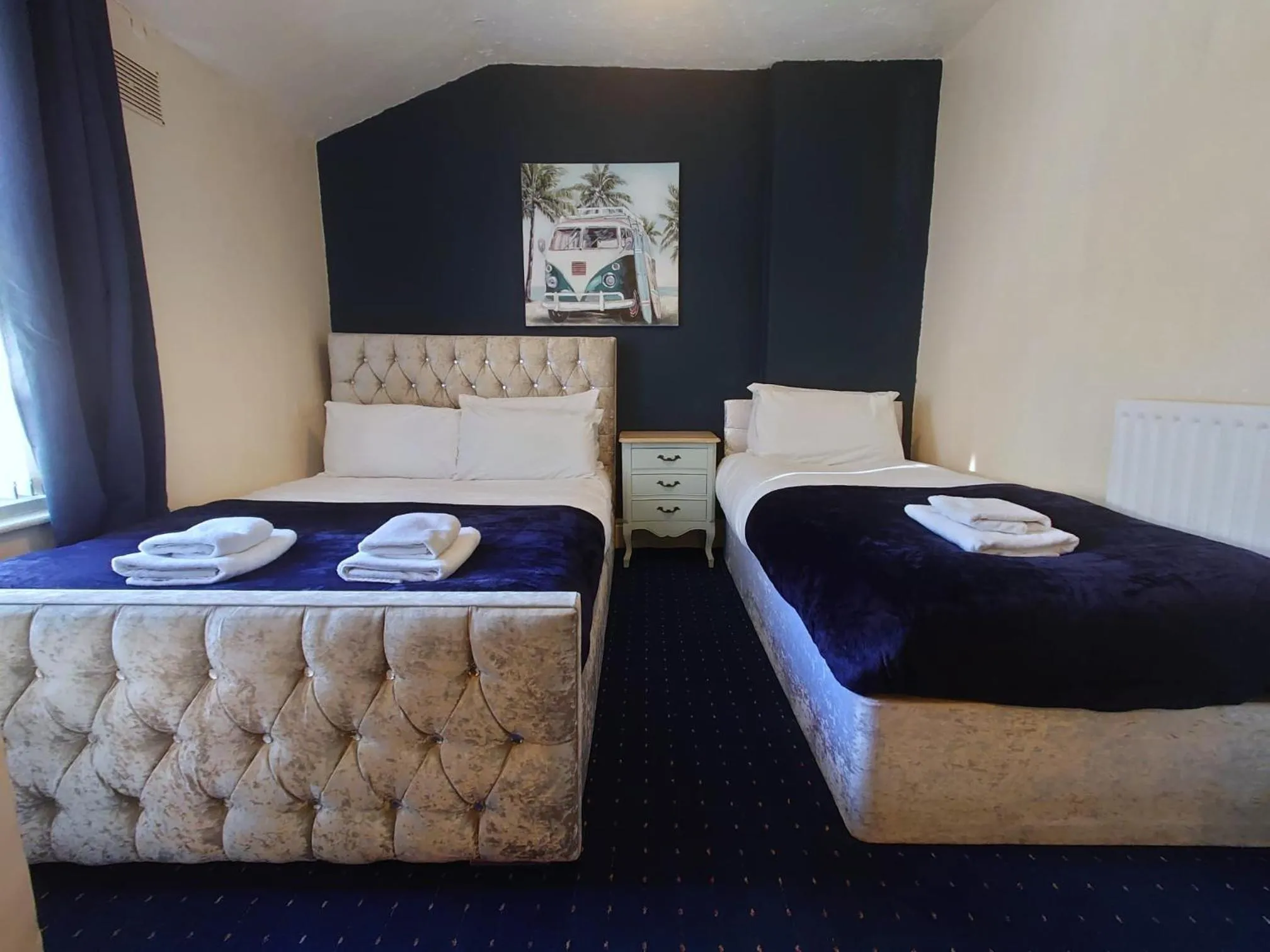 Bed in Harriette's Guest House