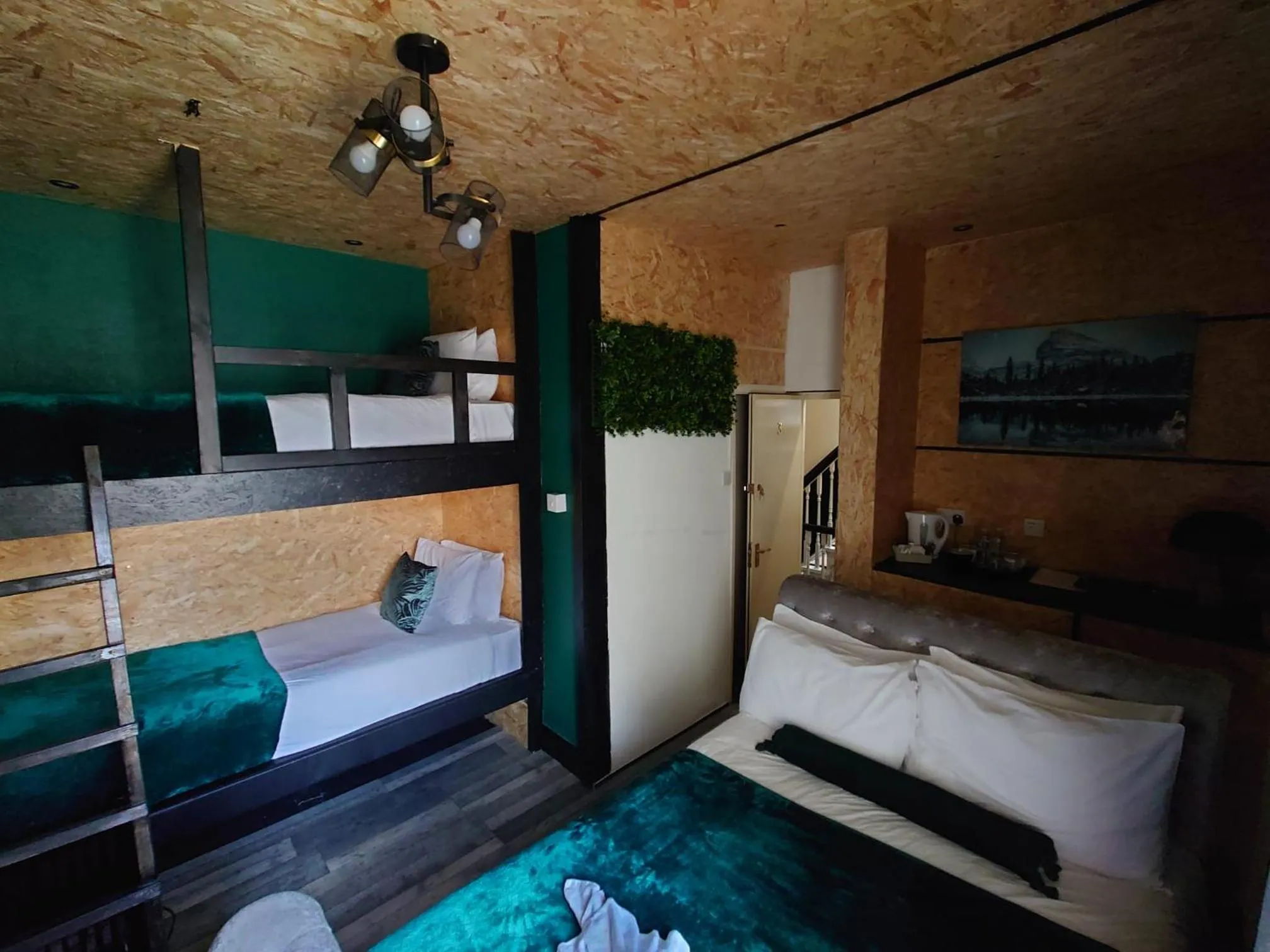 Bed in Harriette's Guest House