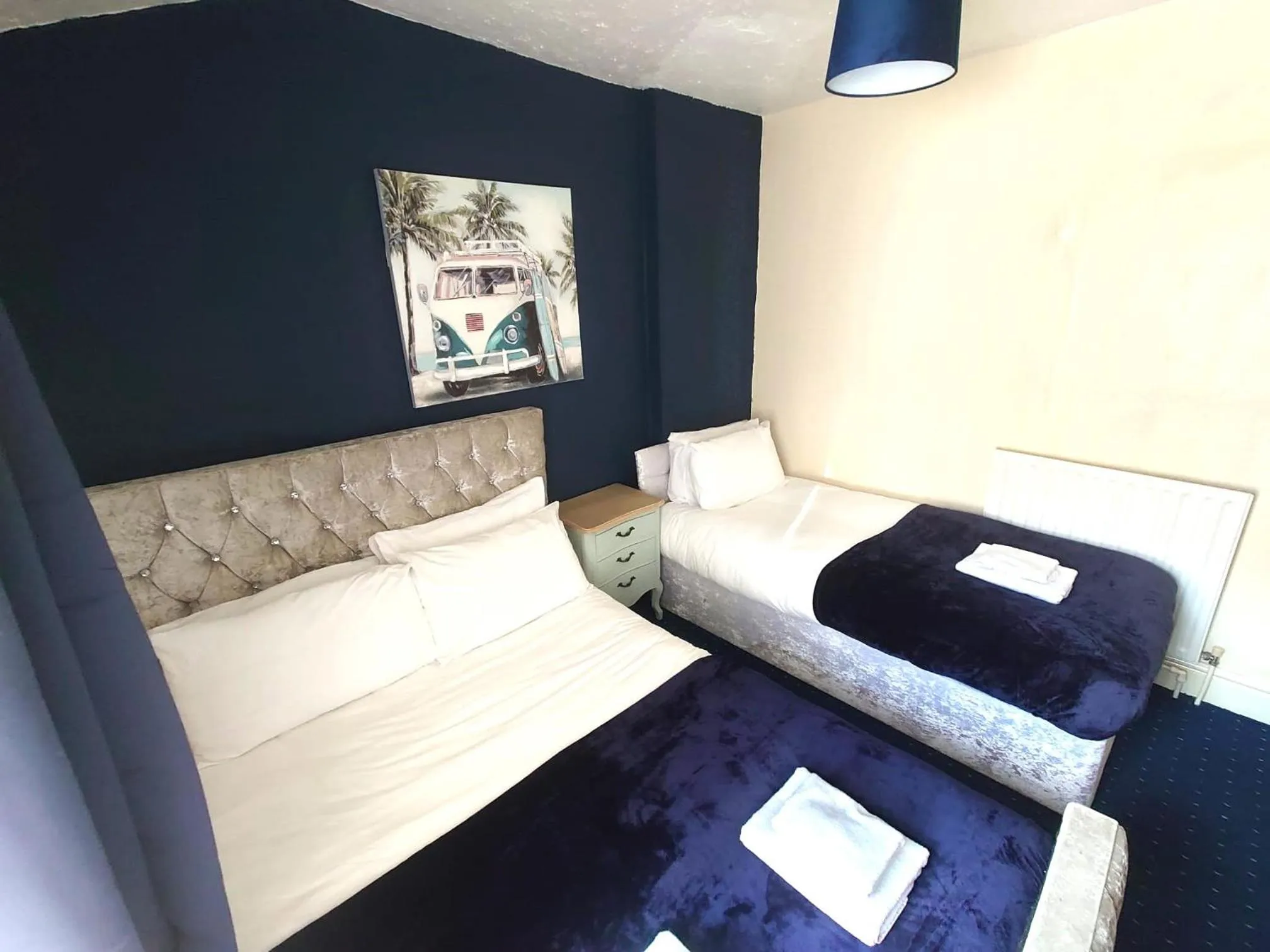 Bed in Harriette's Guest House