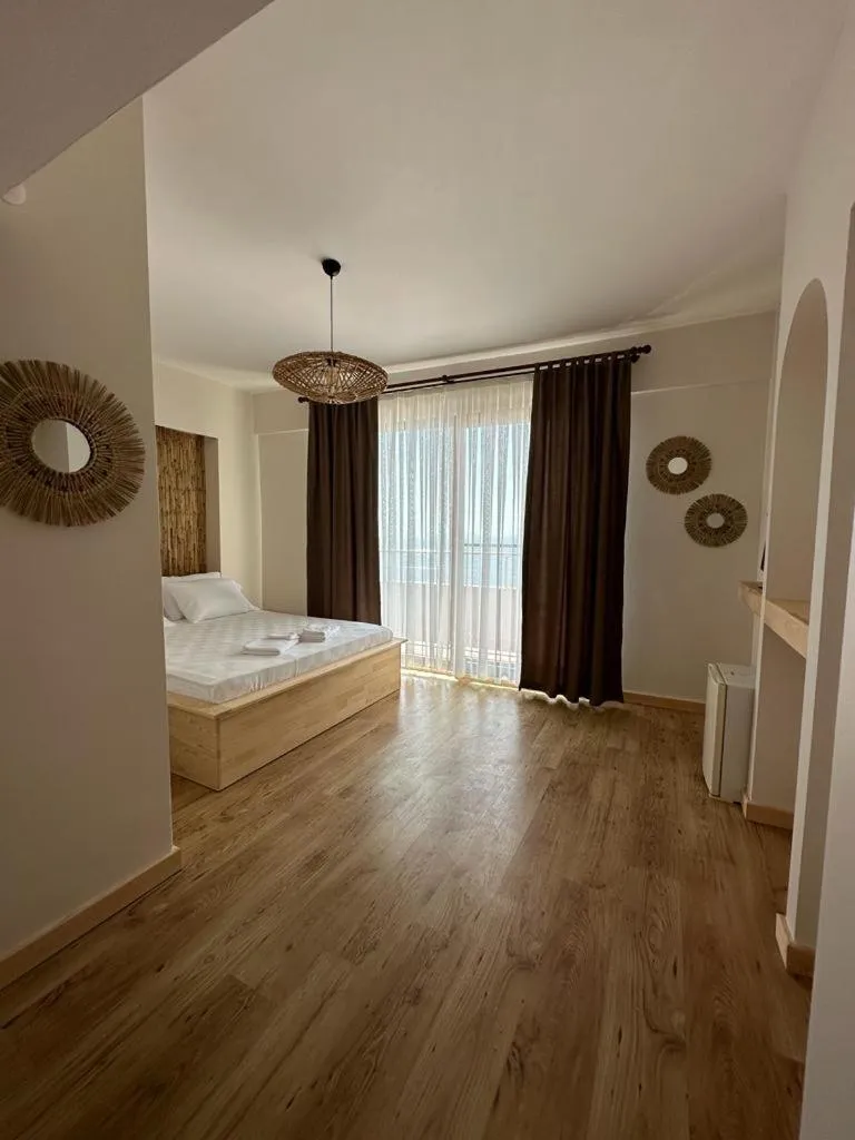 Photo of the whole room, Bed in The Roof Ada