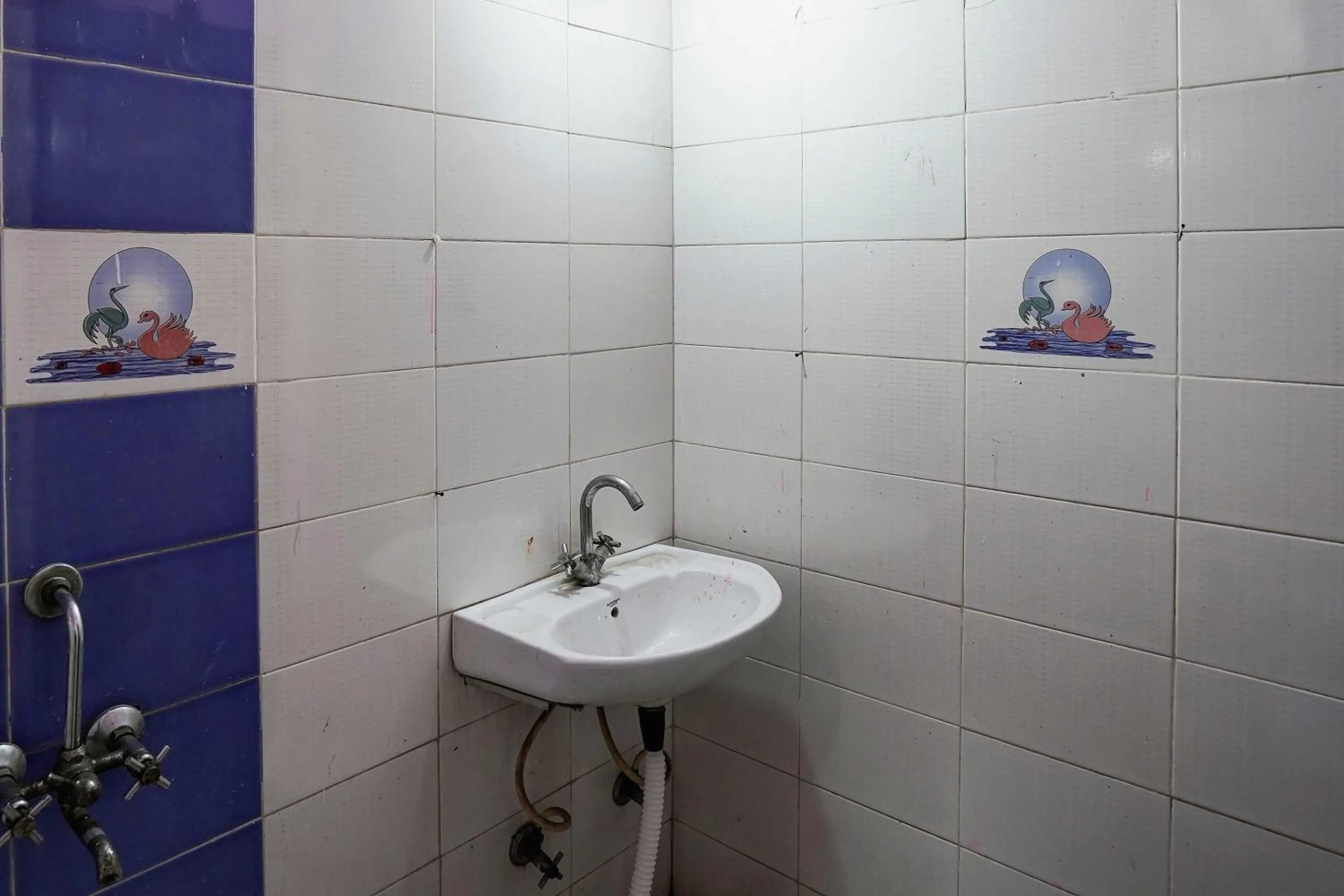 Bathroom in Super Hotel O Khanna Hotel near shakti khand III Indirapuram