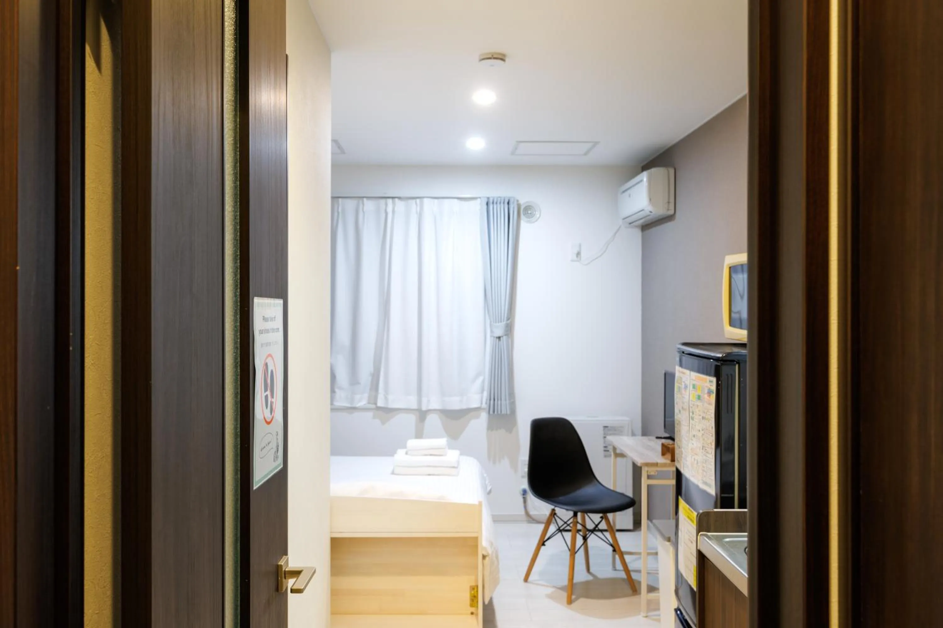 Living room, Bed in Niseko Hirafu Ski Resort Condo