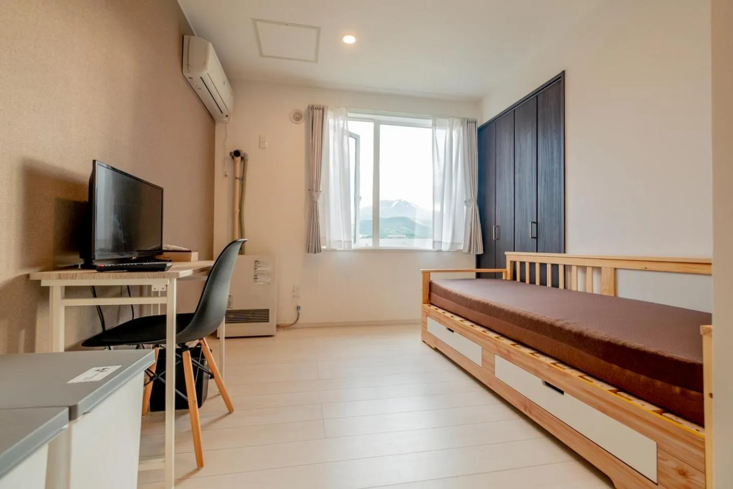 Communal lounge/ TV room in Niseko Hirafu Ski Resort Condo