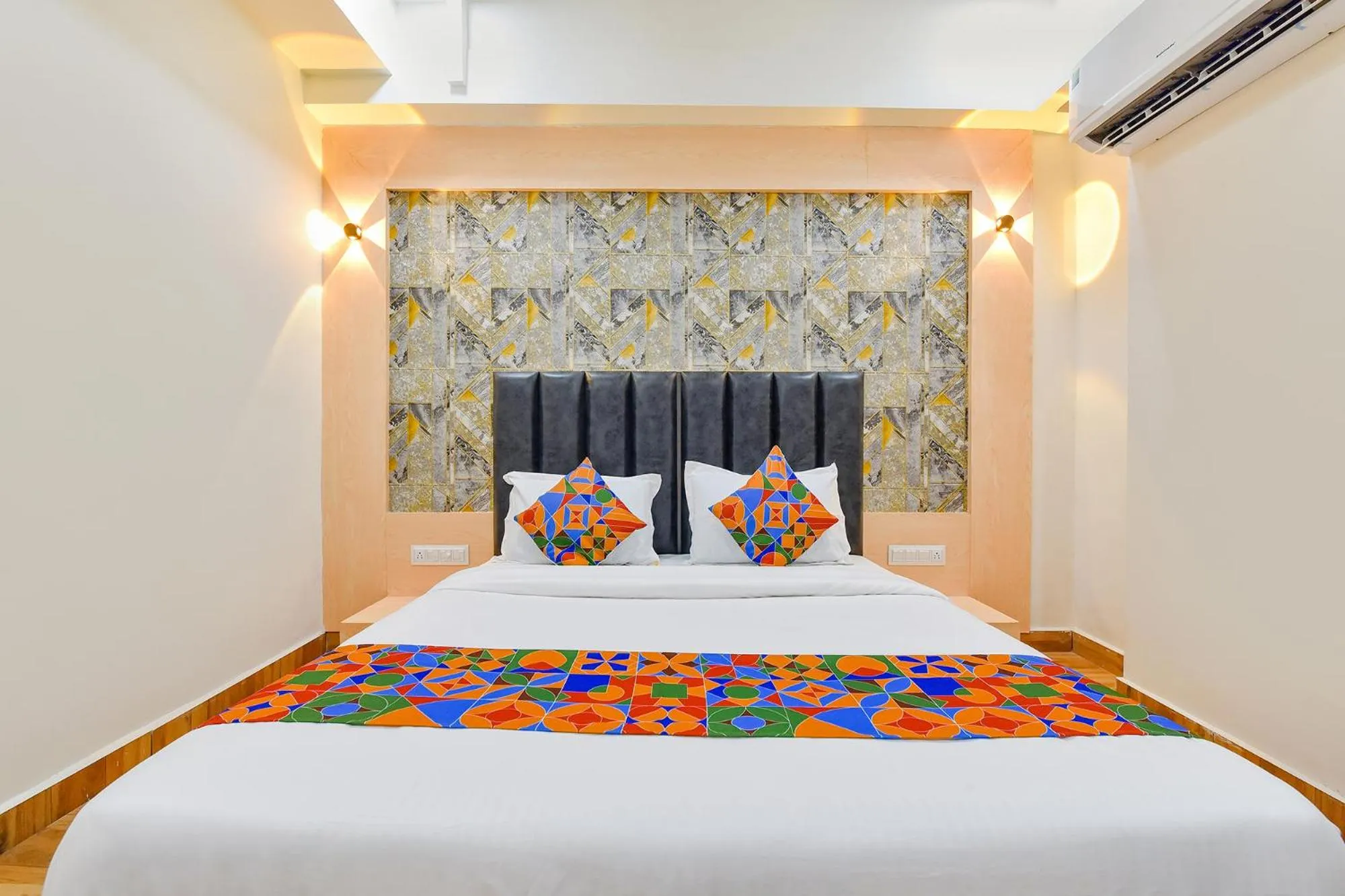 Bed in FabHotel Symphony Grand - Inside Barcelona Complex