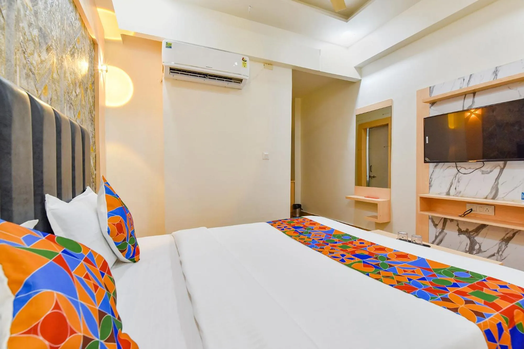 Bed in FabHotel Symphony Grand - Inside Barcelona Complex