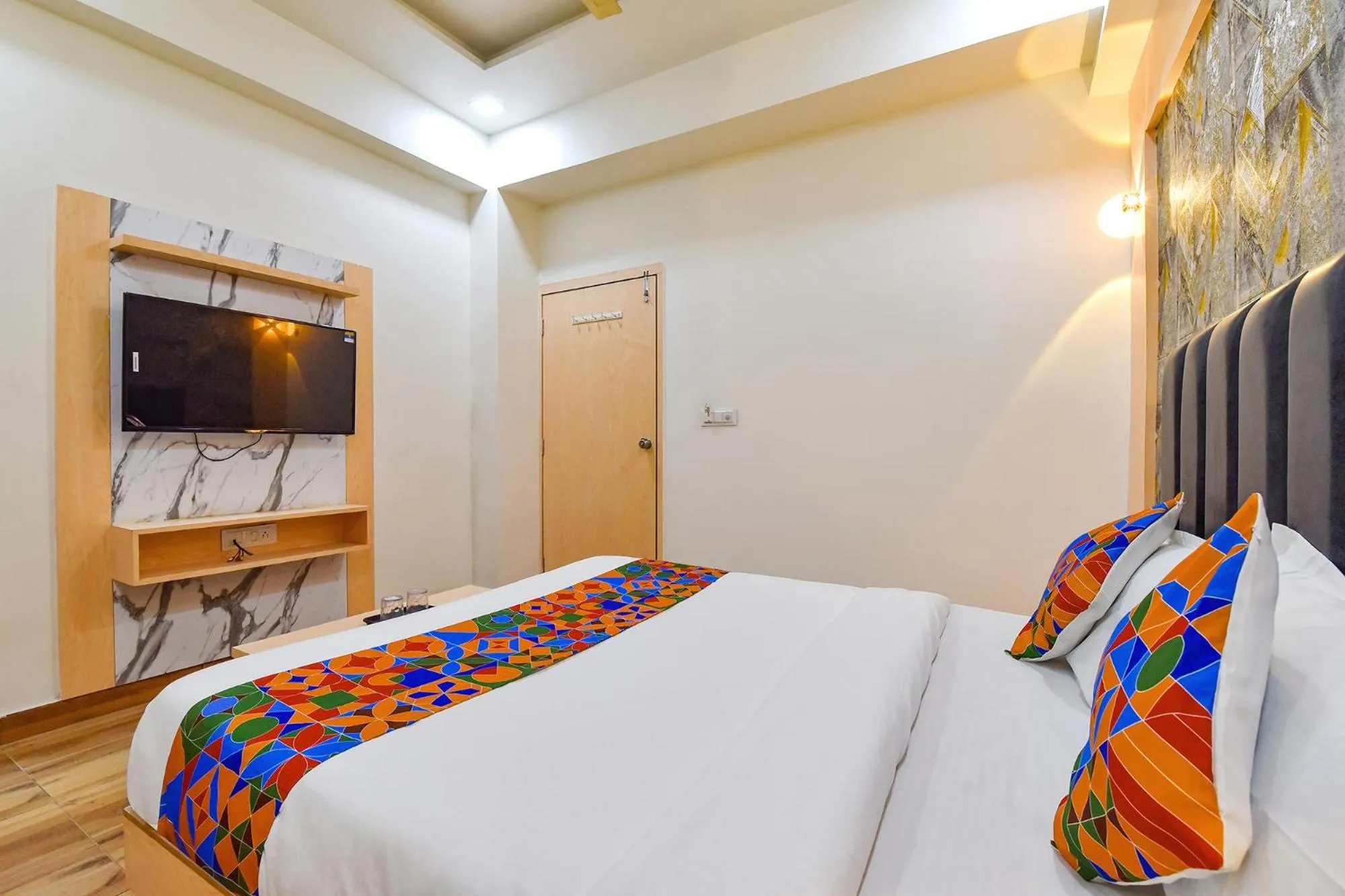 Bed in FabHotel Symphony Grand - Inside Barcelona Complex