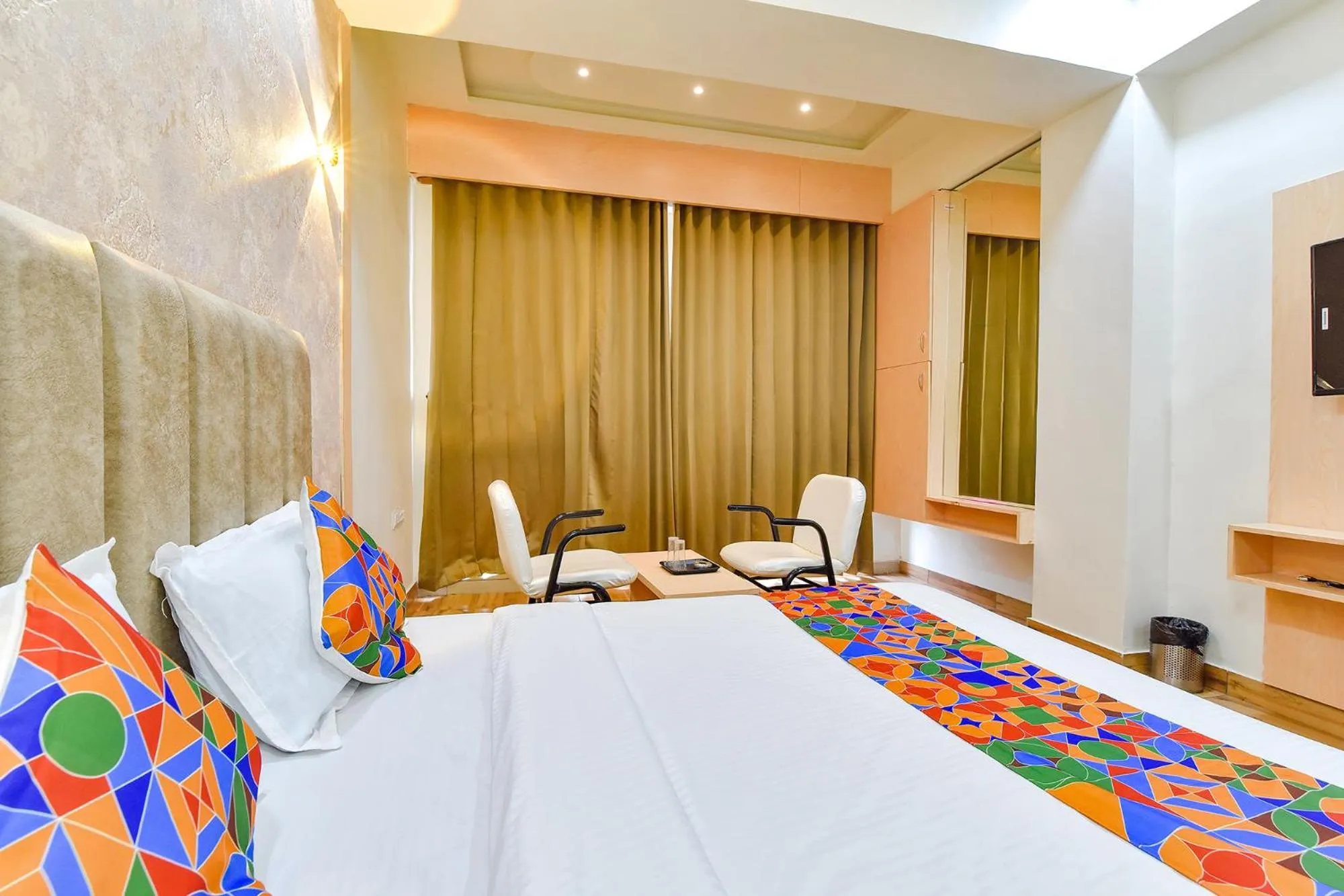 Bed in FabHotel Symphony Grand - Inside Barcelona Complex