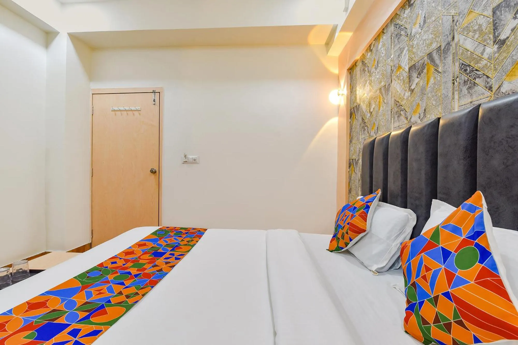 Bed in FabHotel Symphony Grand - Inside Barcelona Complex