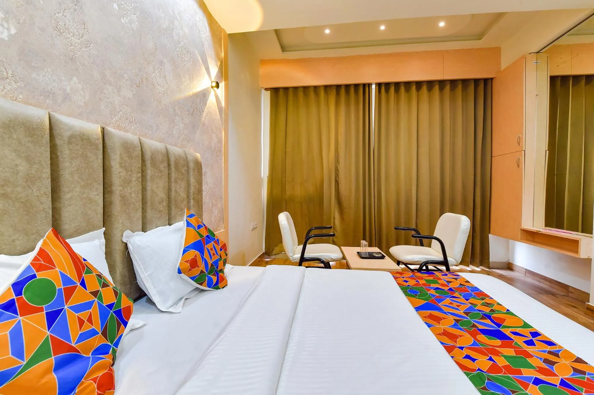 Bed in FabHotel Symphony Grand - Inside Barcelona Complex