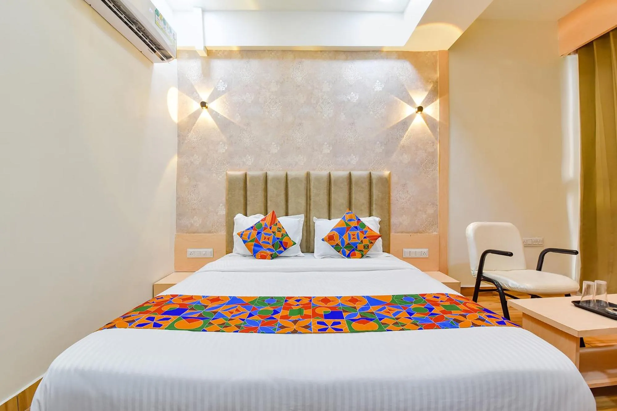 Bed in FabHotel Symphony Grand - Inside Barcelona Complex