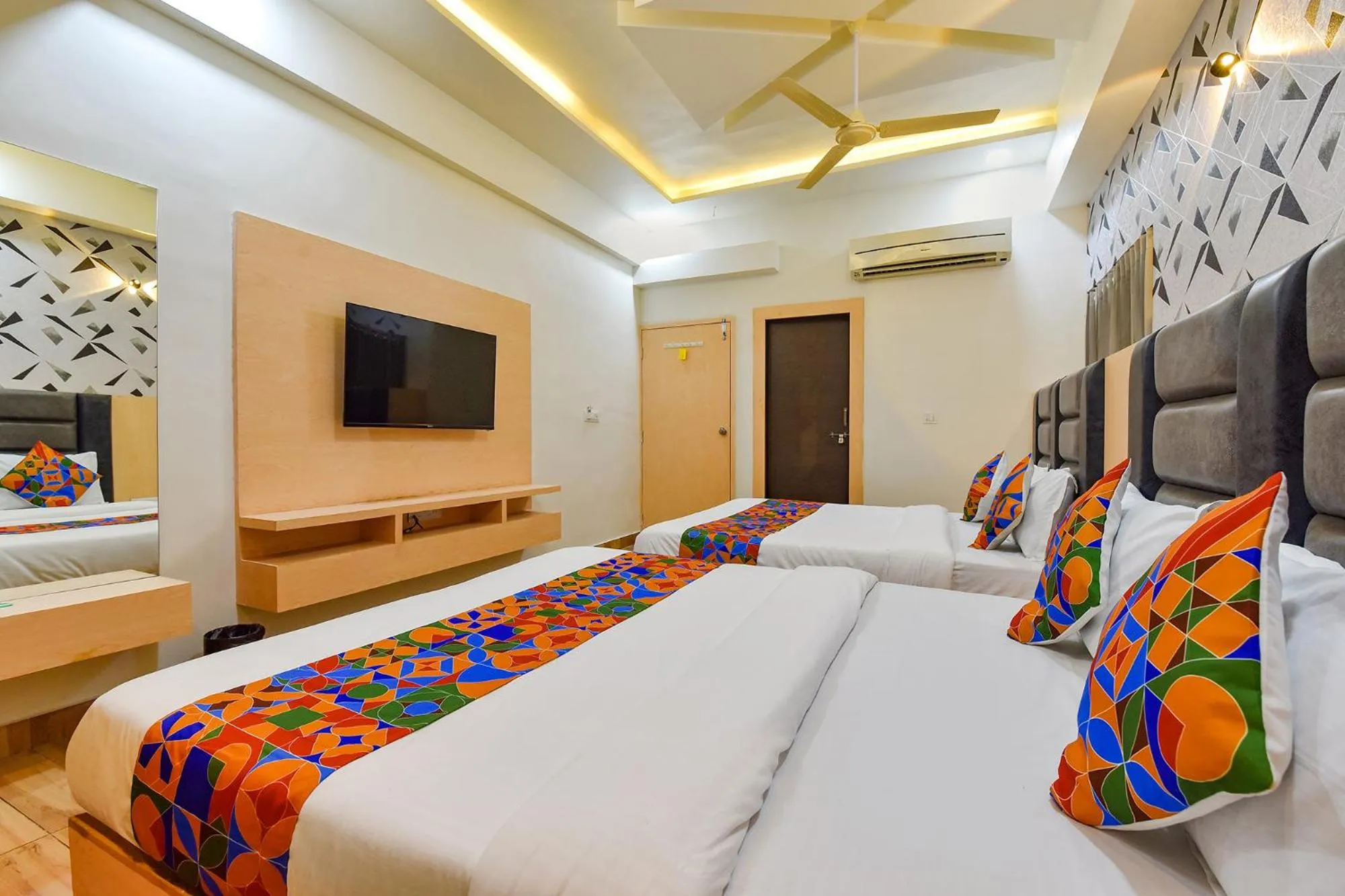 Bed in FabHotel Symphony Grand - Inside Barcelona Complex