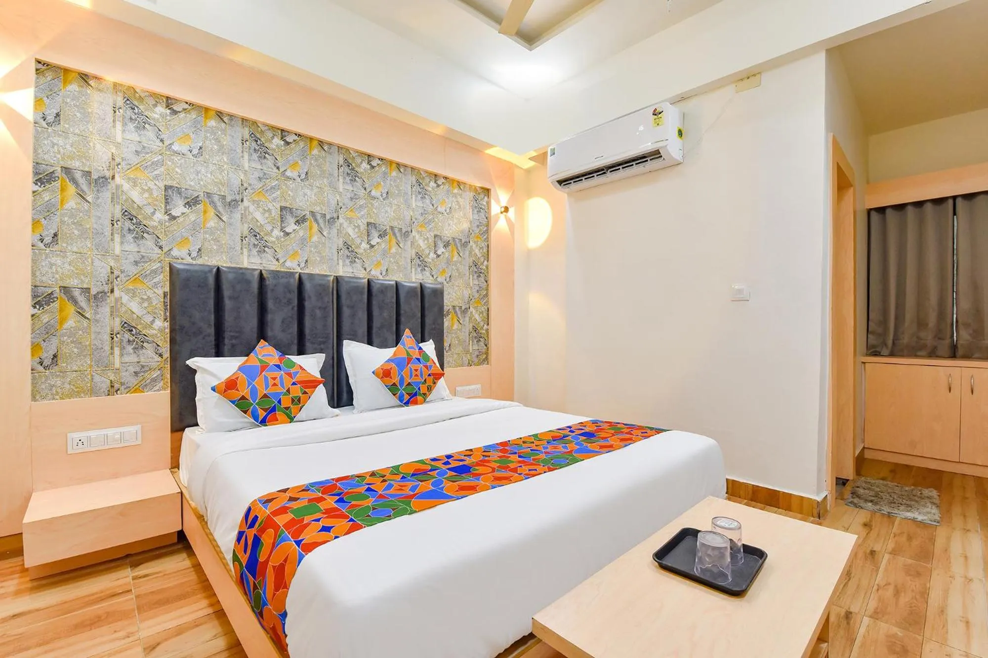 Bed in FabHotel Symphony Grand - Inside Barcelona Complex